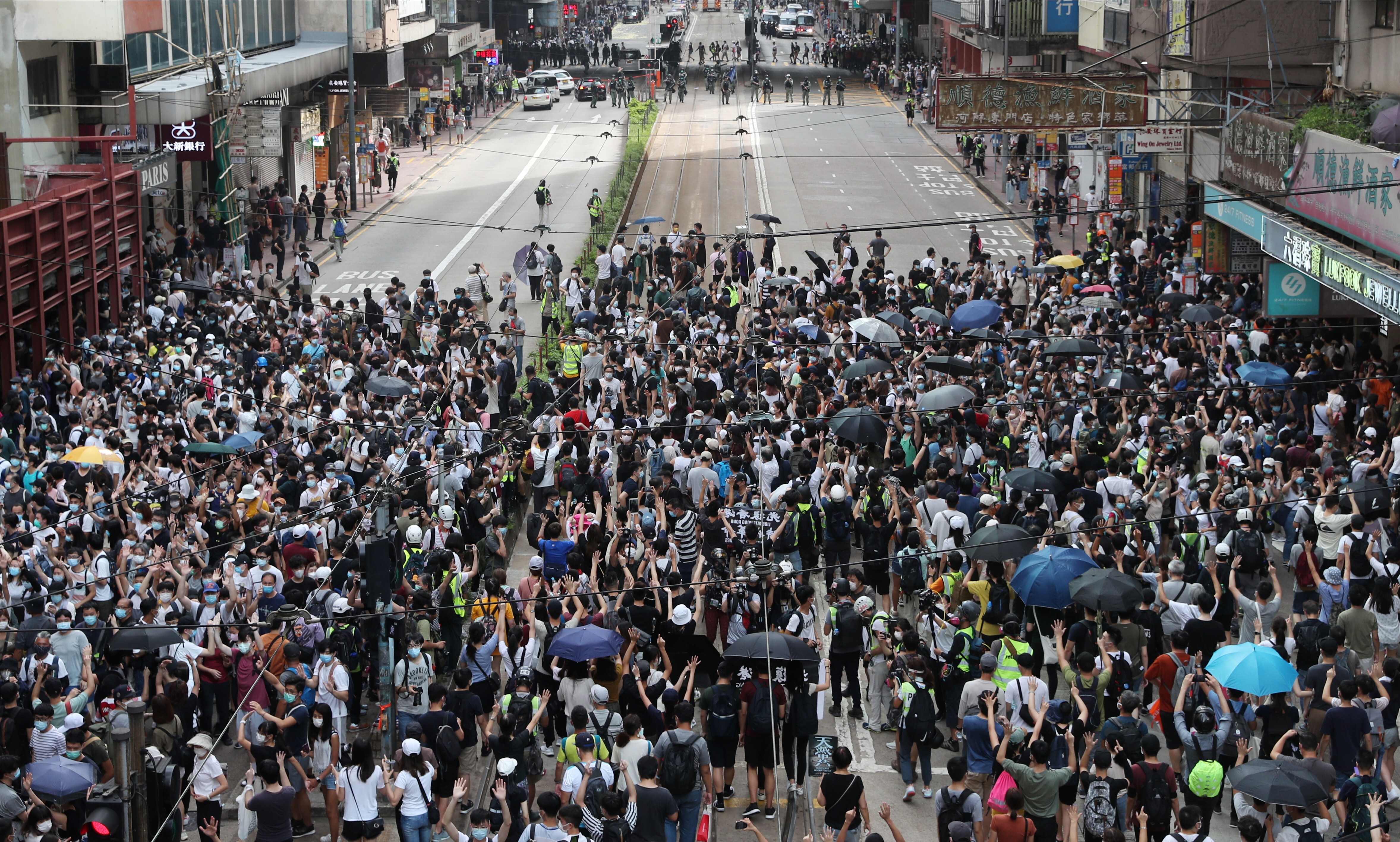 A crowd of anti-government protesters gather on Hennessy Road in Causeway Bay during an illegal march on July 1. Photo: Sam Tsang
