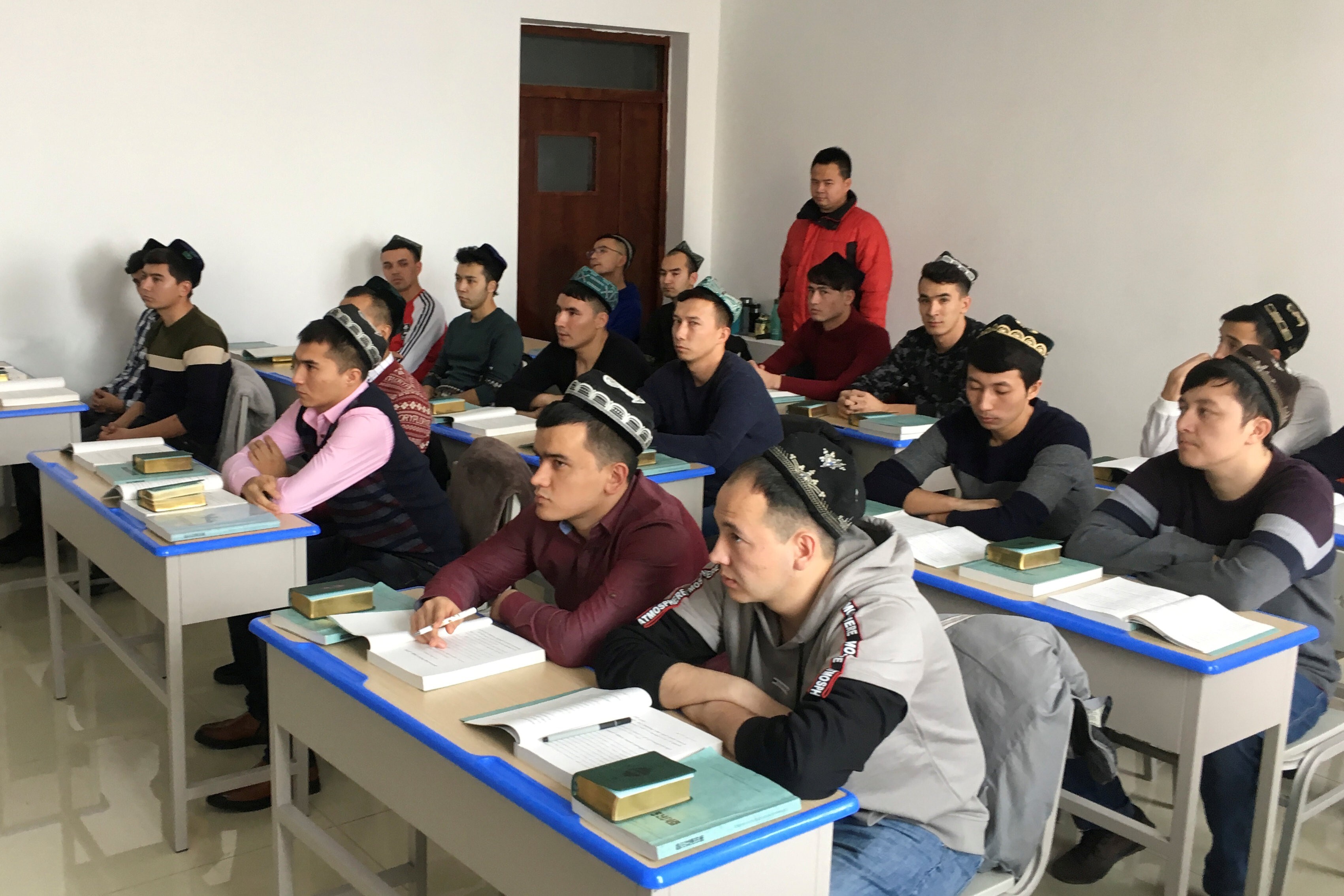 Islamic studies students attend a class at the Xinjiang Islamic Institute during a government-organised trip in Urumqi, Xinjiang Uygur autonomous region, China. Photo: Reuters