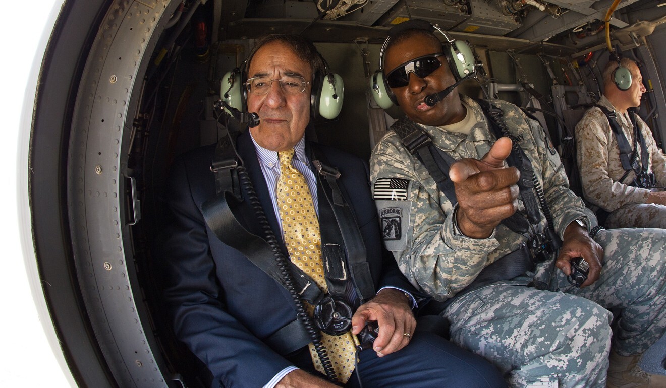 Lloyd Austin, then commanding general of US forces in Iraq, with US Secretary of Defence Leon Panetta in a helicopter over Baghdad in 2011. File photo: AFP