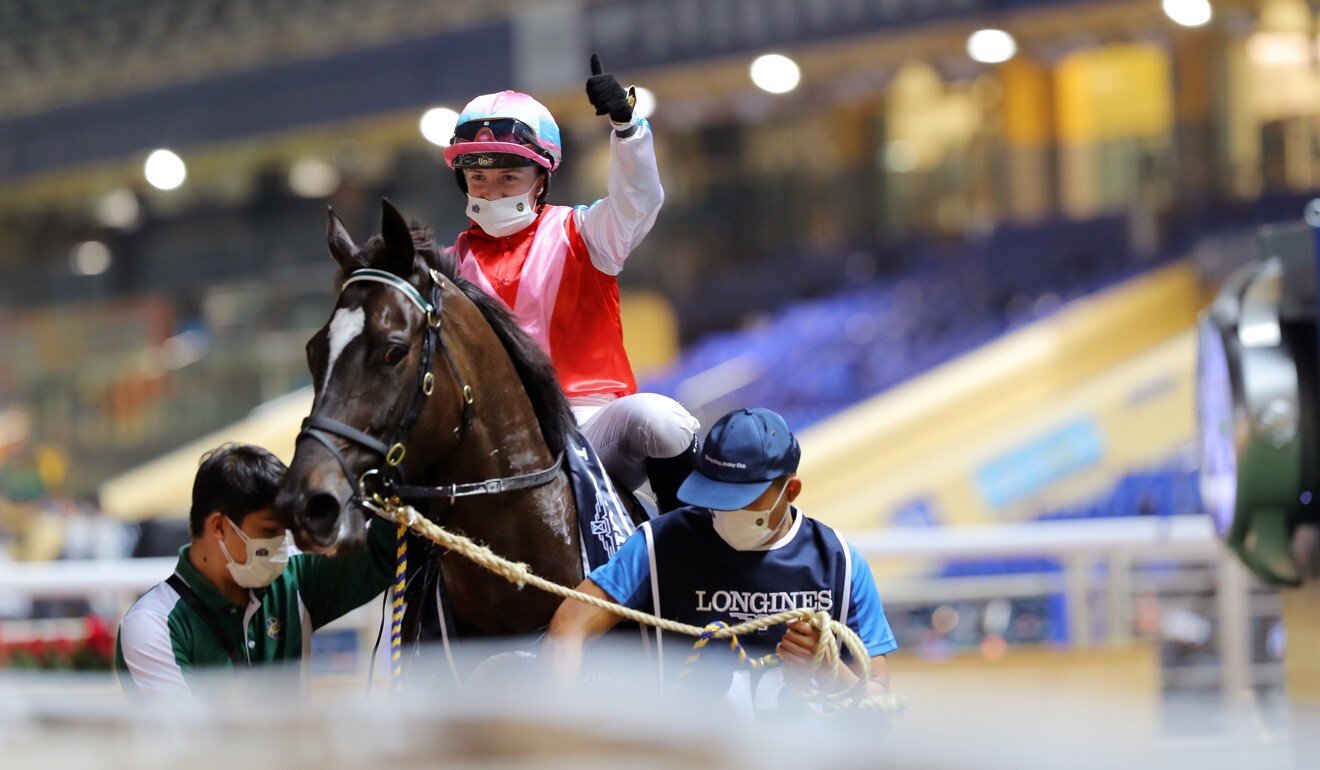 Hollie Doyle celebrates her victory aboard Harmony N Blessed at Happy Valley.