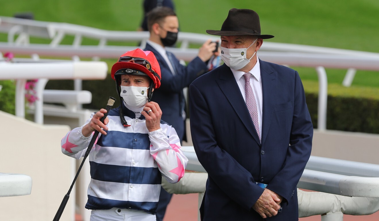 Jockey Zac Purton with David Hayes after Master Montaro’s win at Sha Tin.