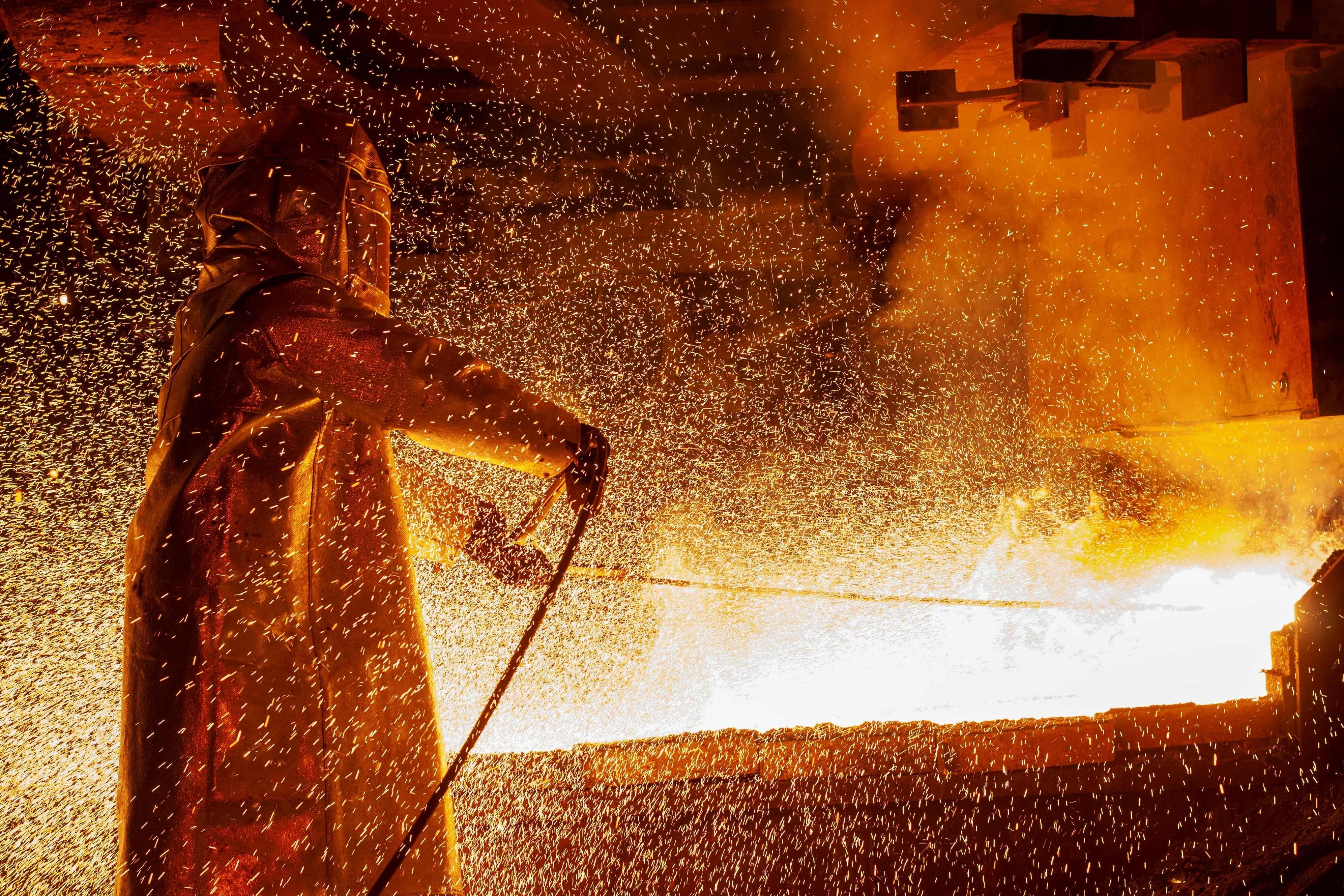 A worker mans a furnace during the nickel-smelting process at a plant in Indonesia. Photo: AFP
