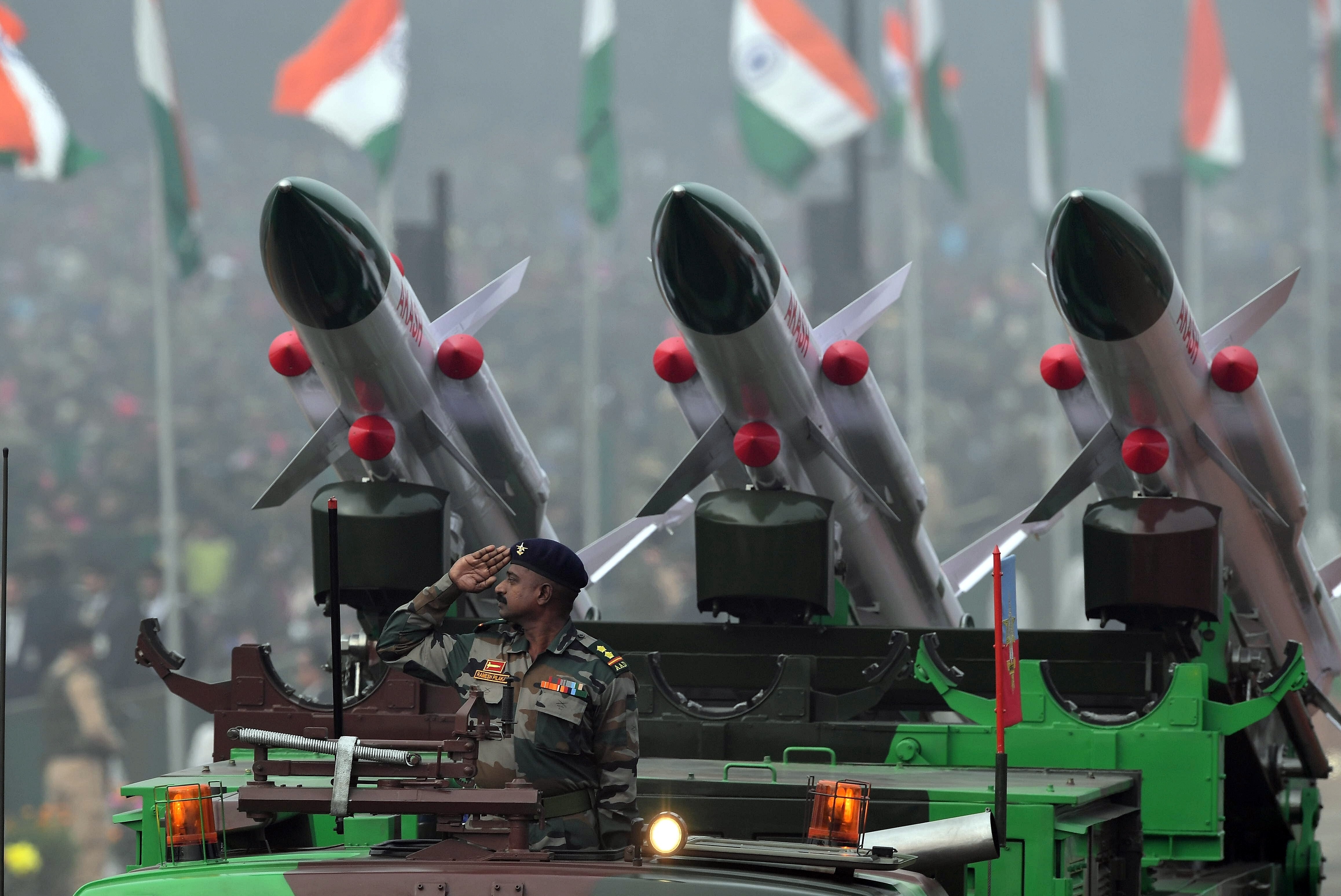 A member of the Indian army salutes from an Akash rocket launcher vehicle during the country’s 69th Republic Day parade in New Delhi on January 26, 2018. In terms of military expenditure, India ranks third in the world after the US and China. Photo: AFP