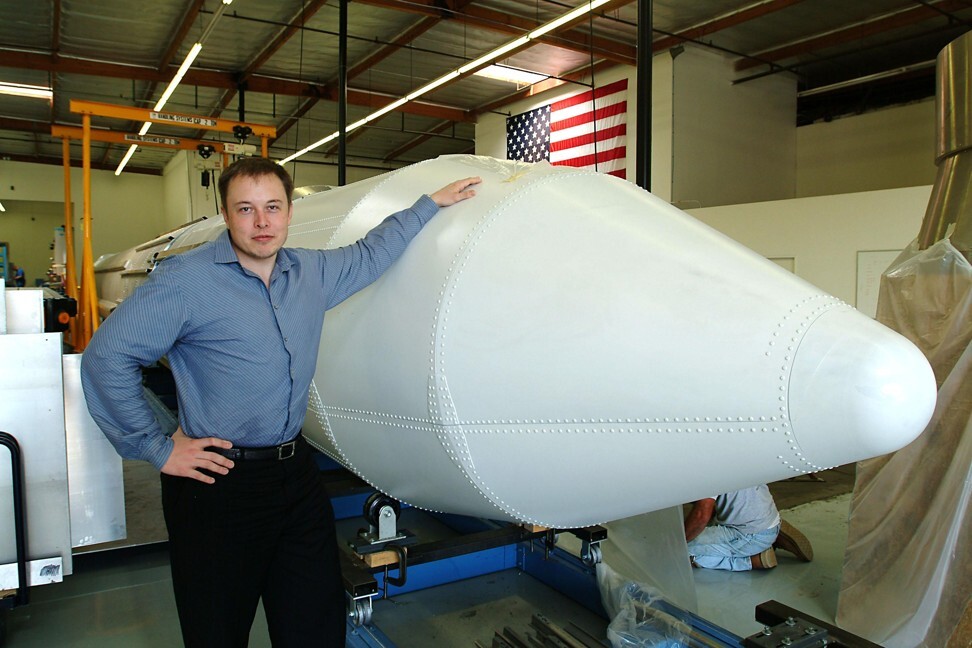 Tesla and SpaceX founder Elon Musk with a rocket in March 2004 in Los Angeles, California. Photo: Getty Images