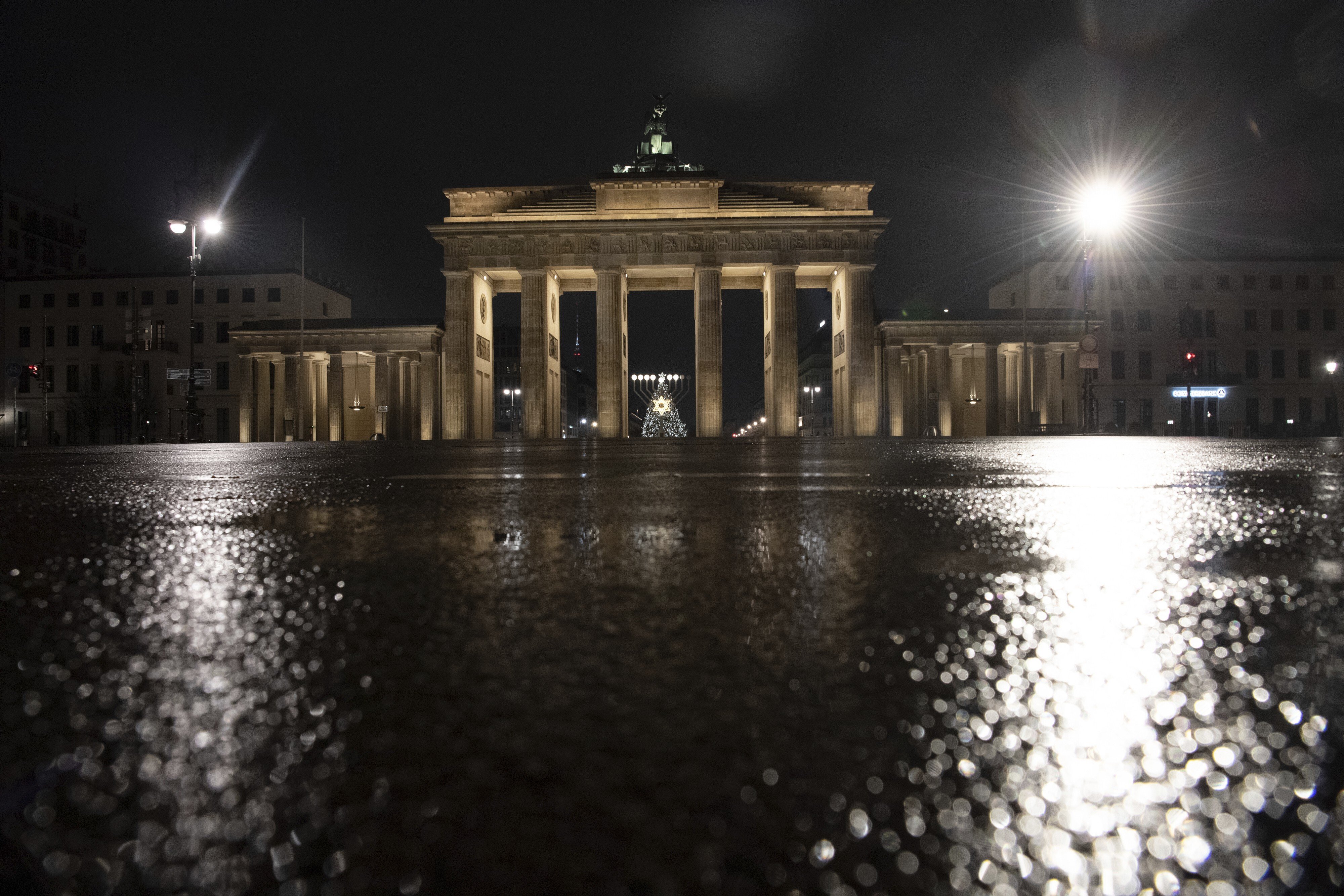 The square in front of the Brandenburg Gate is deserted in Berlin, Germany, early Wednesday. Photo: AP