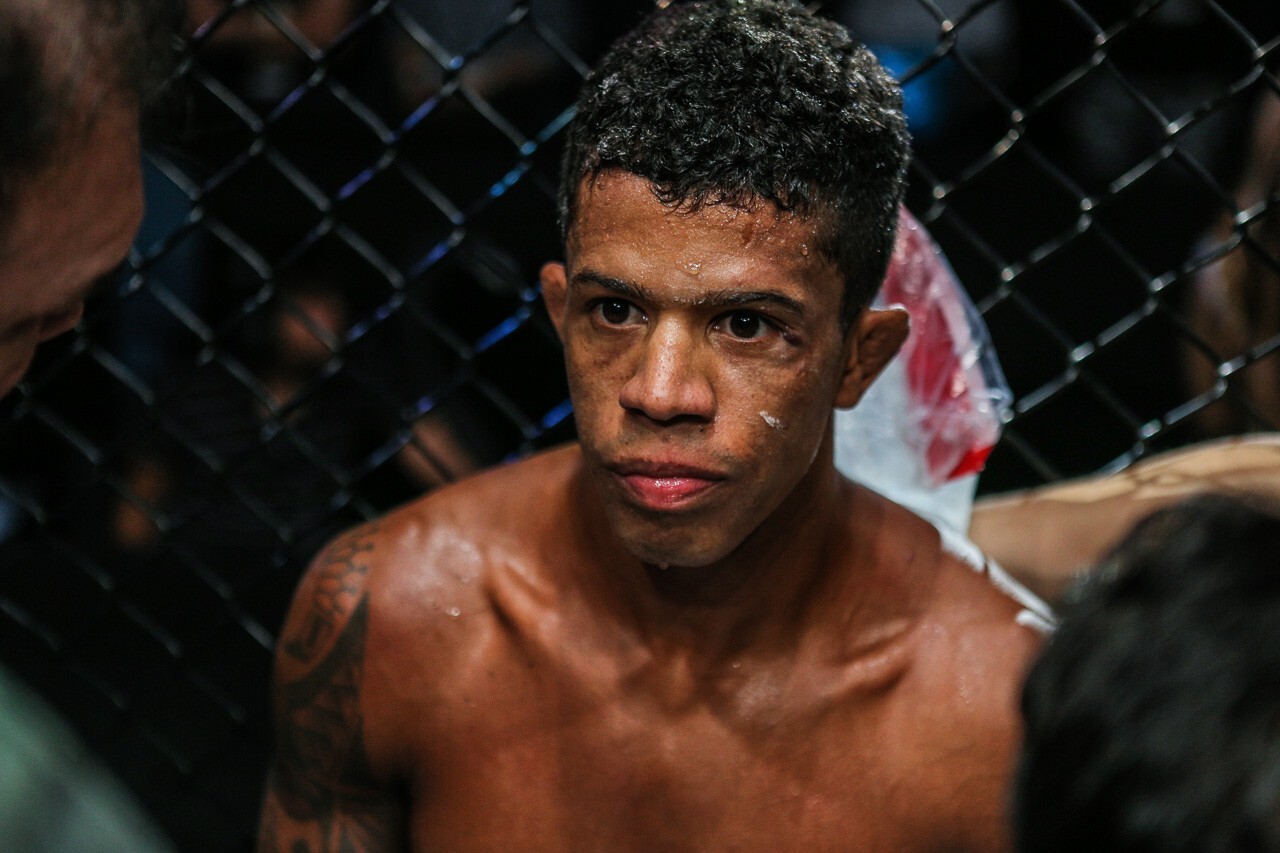 Adriano Moraes focuses on the job between rounds. Photos: ONE Championship