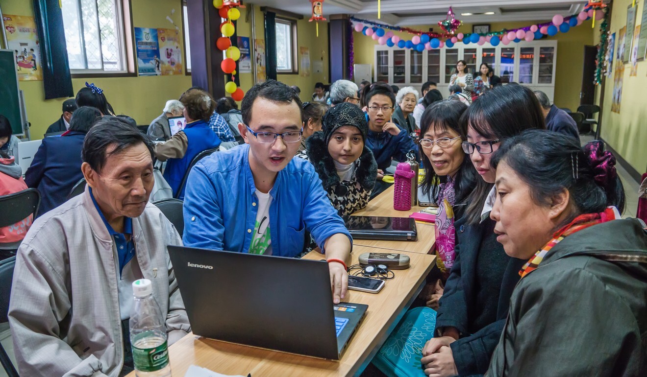 Elderly Beijingers learn how to use digital devices at a session provided by See Young, a charity which has been helping old people navigate the digital world since 2011. Photo: courtesy of See Young Elderly Beijingers learn how to use digital devices at a session provided by See Young, a charity which has been helping old people navigate the digital world since 2011. Photo: courtesy of See Young