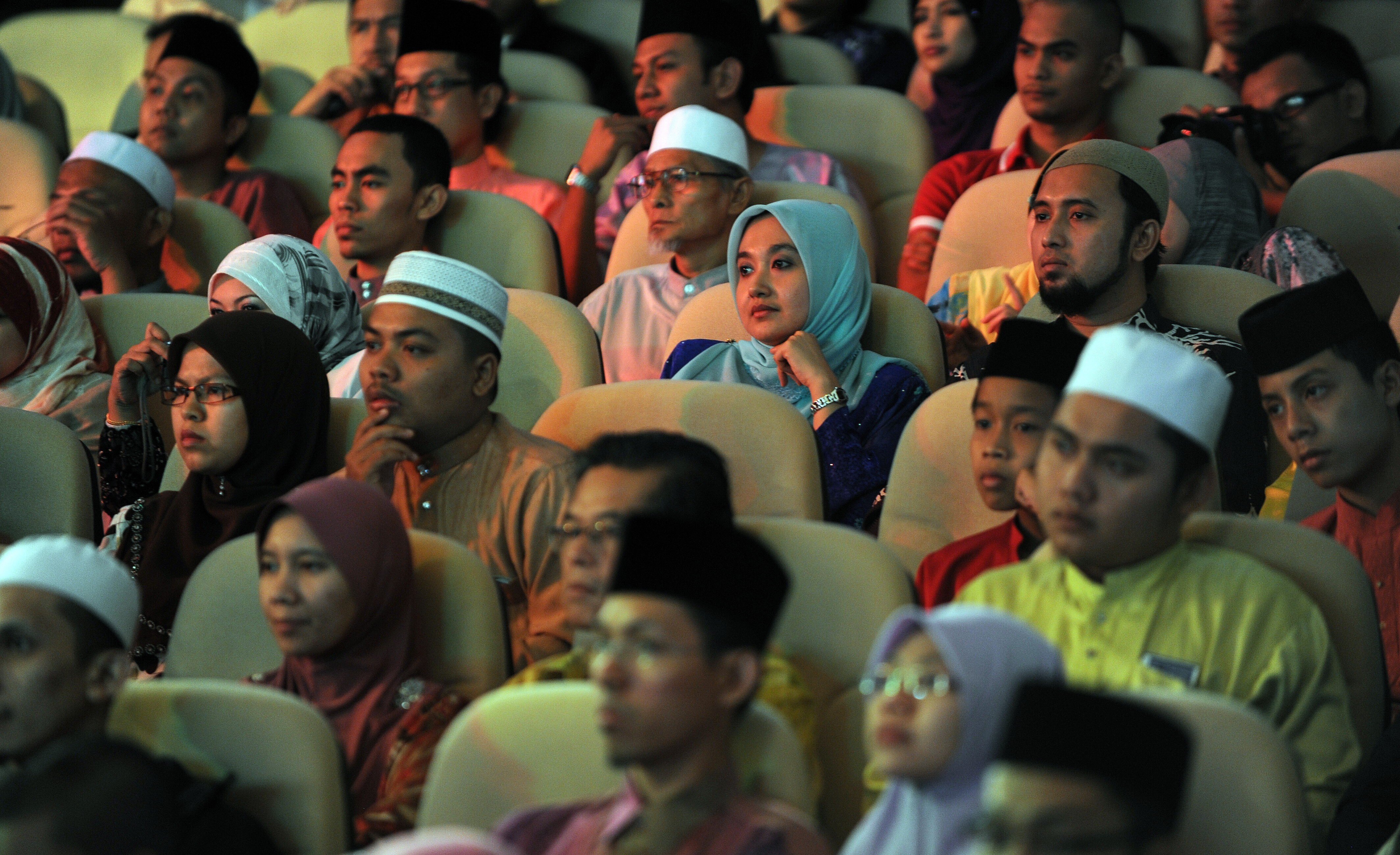 An audience watches a live performance of the Malaysian reality TV competition ‘Young Imam’ in Kuala Lumpur. Photo: AFP