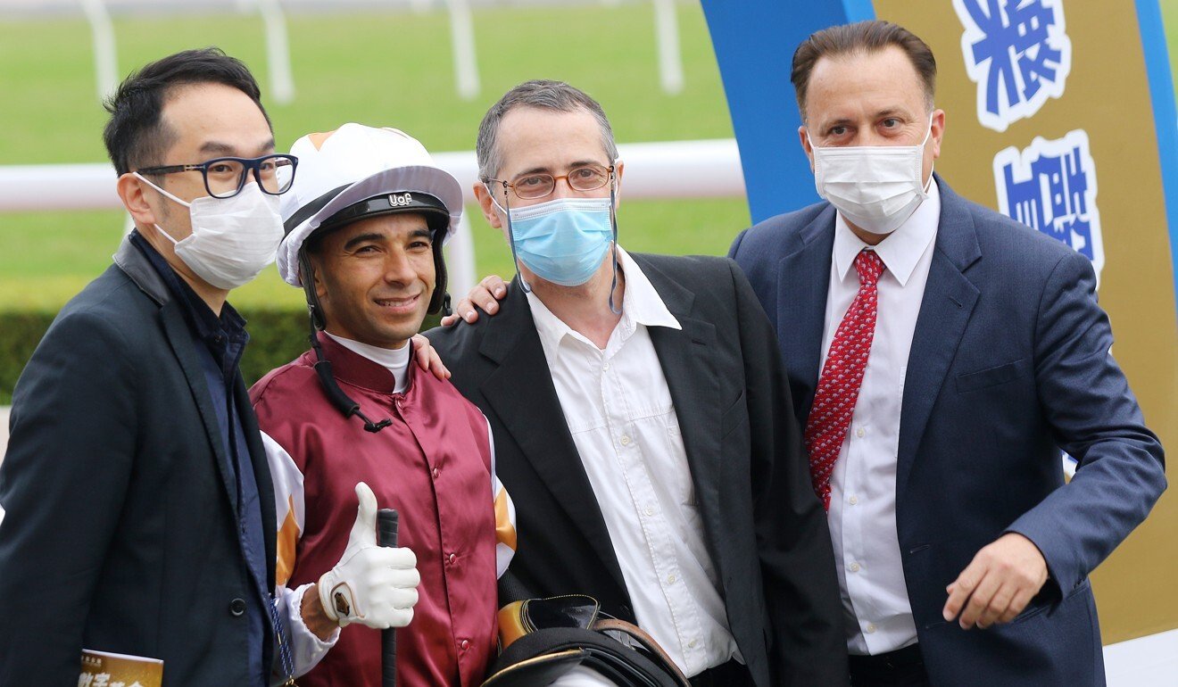 Jockey Joao Moreira and trainer Caspar Fownes (right) celebrate Forte’s win with connections.