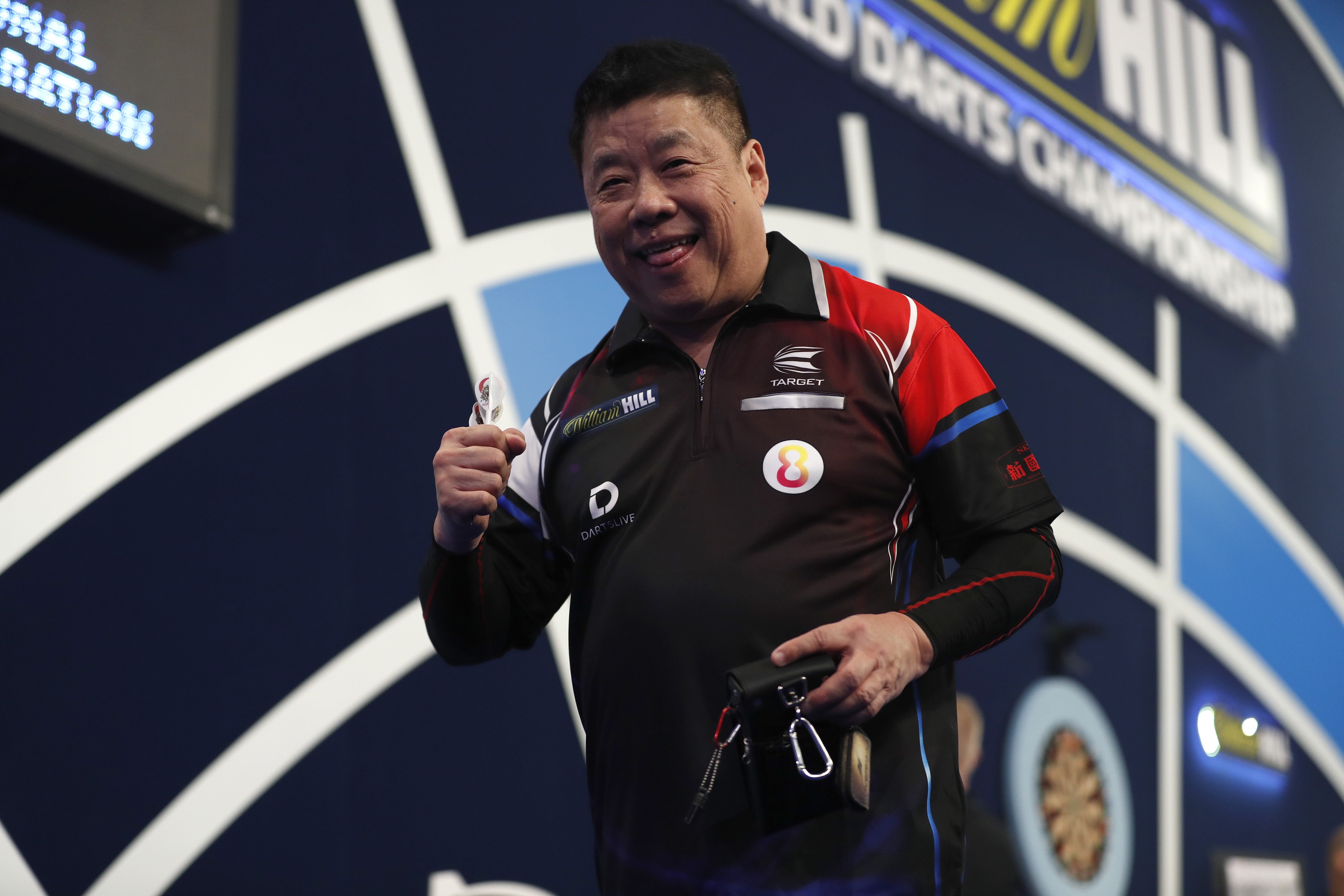 Paul Lim, of Singapore, reacts during his first-round match against England’s Luke Humphries during day four of the PDC William Hill World Darts Championship at Alexandra Palace. Photo: Getty Images