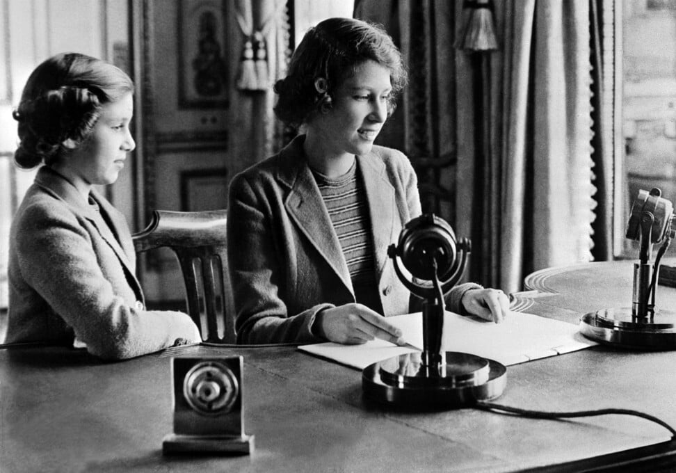 Picture taken October 1940 in Windsor showing the Princess Elizabeth and her sister Princess Margaret sending a message during the BBC’s children programme, to those being evacuated because of the war. Photo: AP