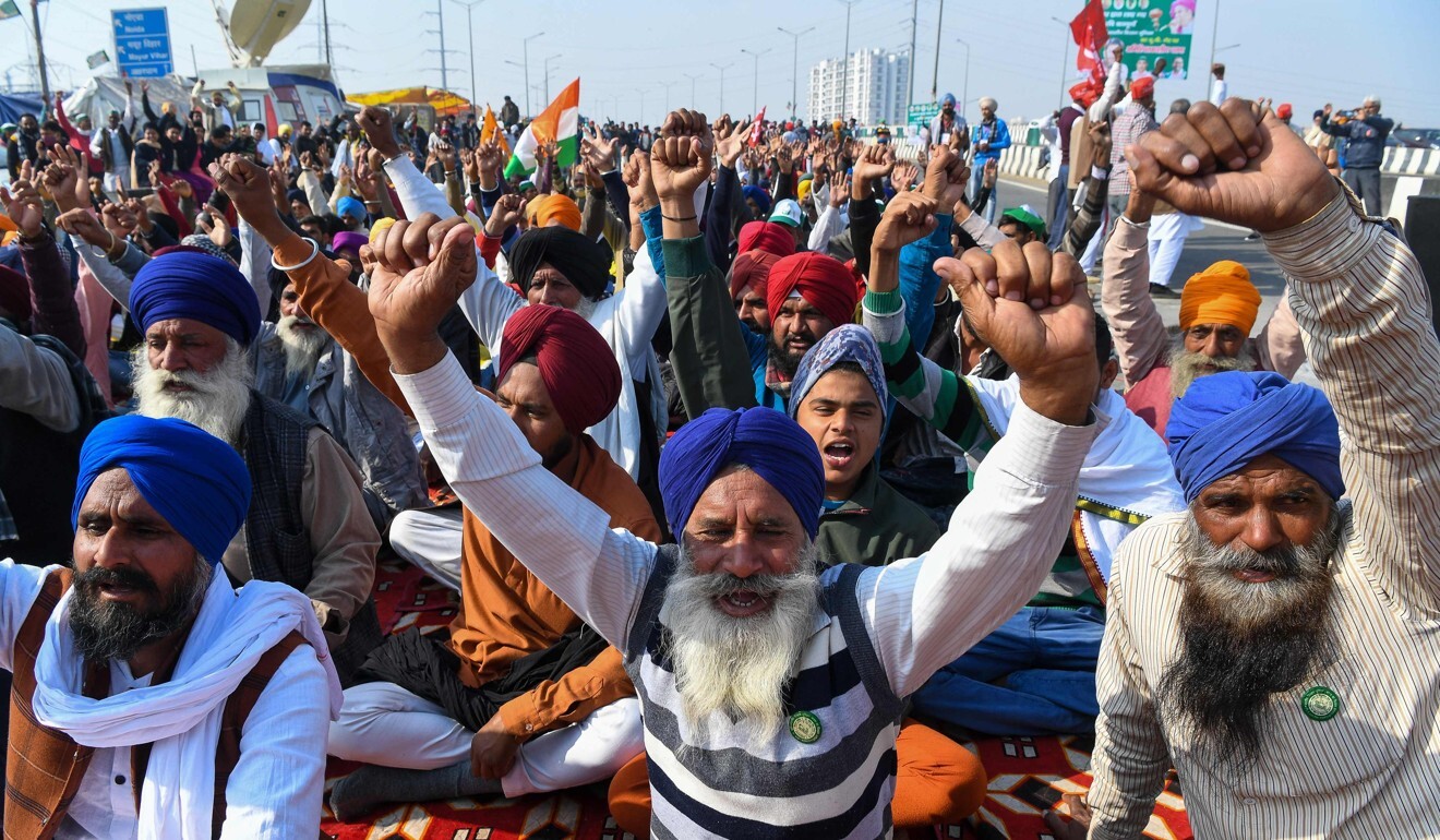 Farmers shout slogans during a protest against the central government’s recent agricultural reforms at the Delhi-Uttar Pradesh state border in Ghazipur on Saturday. Photo: AFP