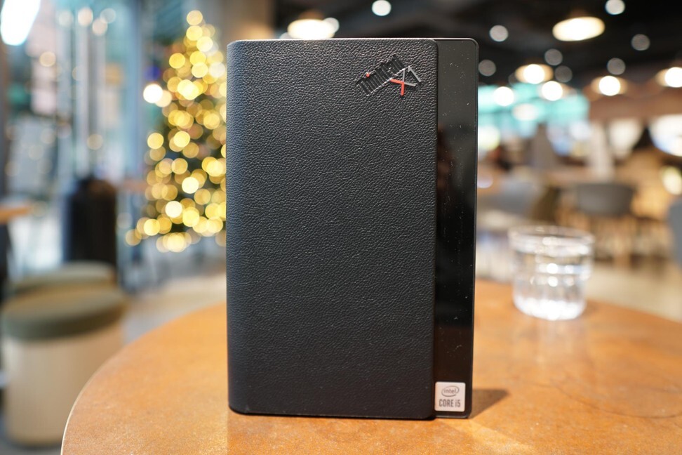 When folded, the Lenovo ThinkPad X1 Fold has dimensions and thickness resembling a hardcover book. Photo: Ben Sin