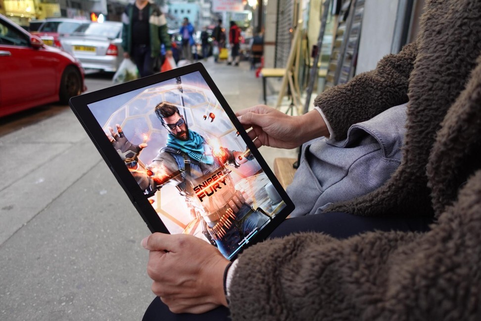 When unfolded the Lenovo ThinkPad X1 Fold tablet offers an immersive 13.3-inch viewing experience. Photo: Ben Sin