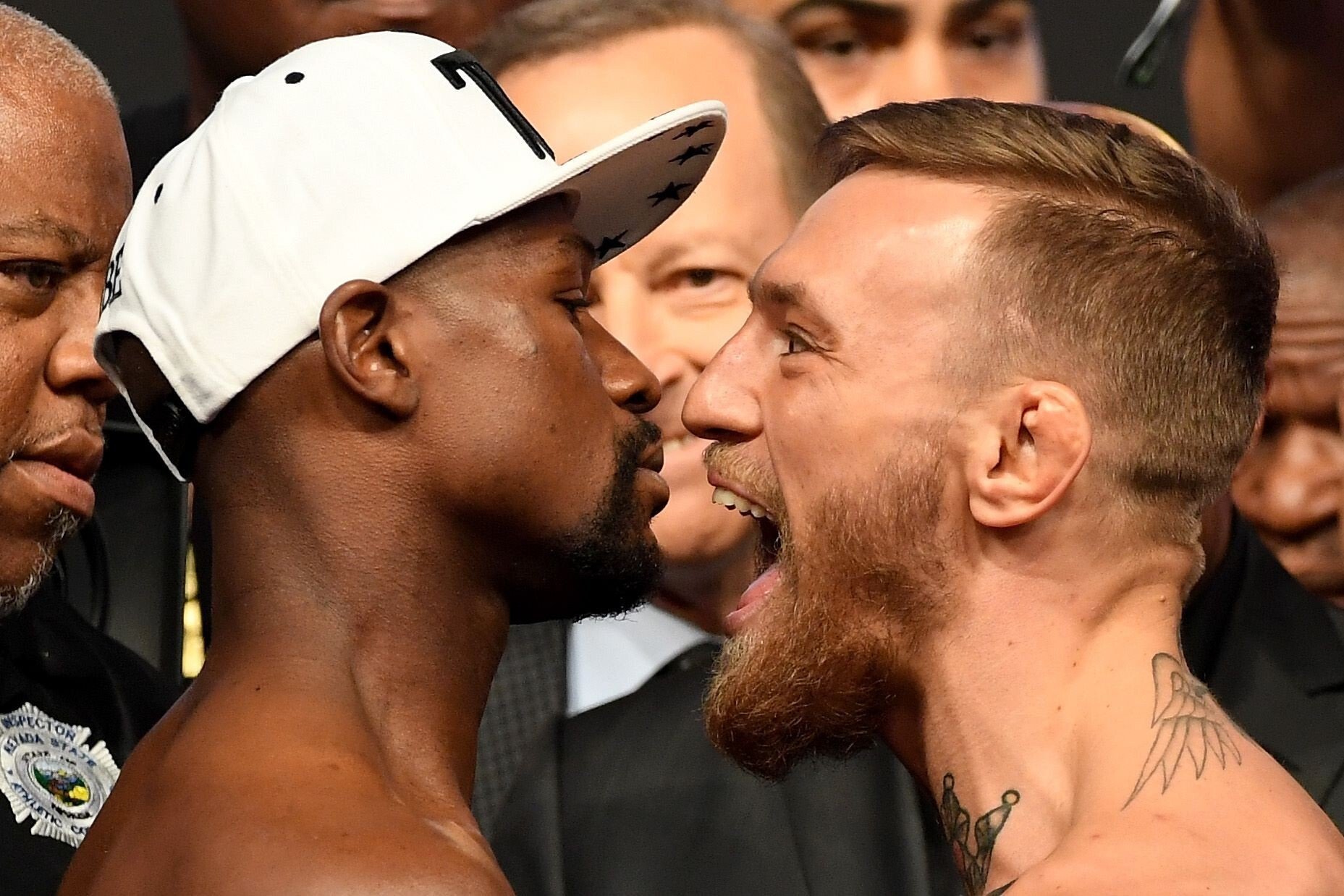 Retired boxing legend Floyd Mayweather Jnr and former UFC double champion Conor McGregor face off after the official weigh-ins for their superfight in Las Vegas in 2017. Photo: AFP