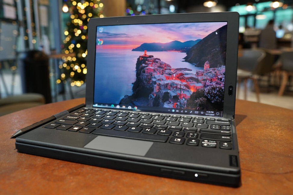 The Lenovo X1 Fold’s keyboard can connect magnetically to the bottom of the tablet, so that it can be folded 90 degrees and become a clamshell laptop. Photo: Ben Sin