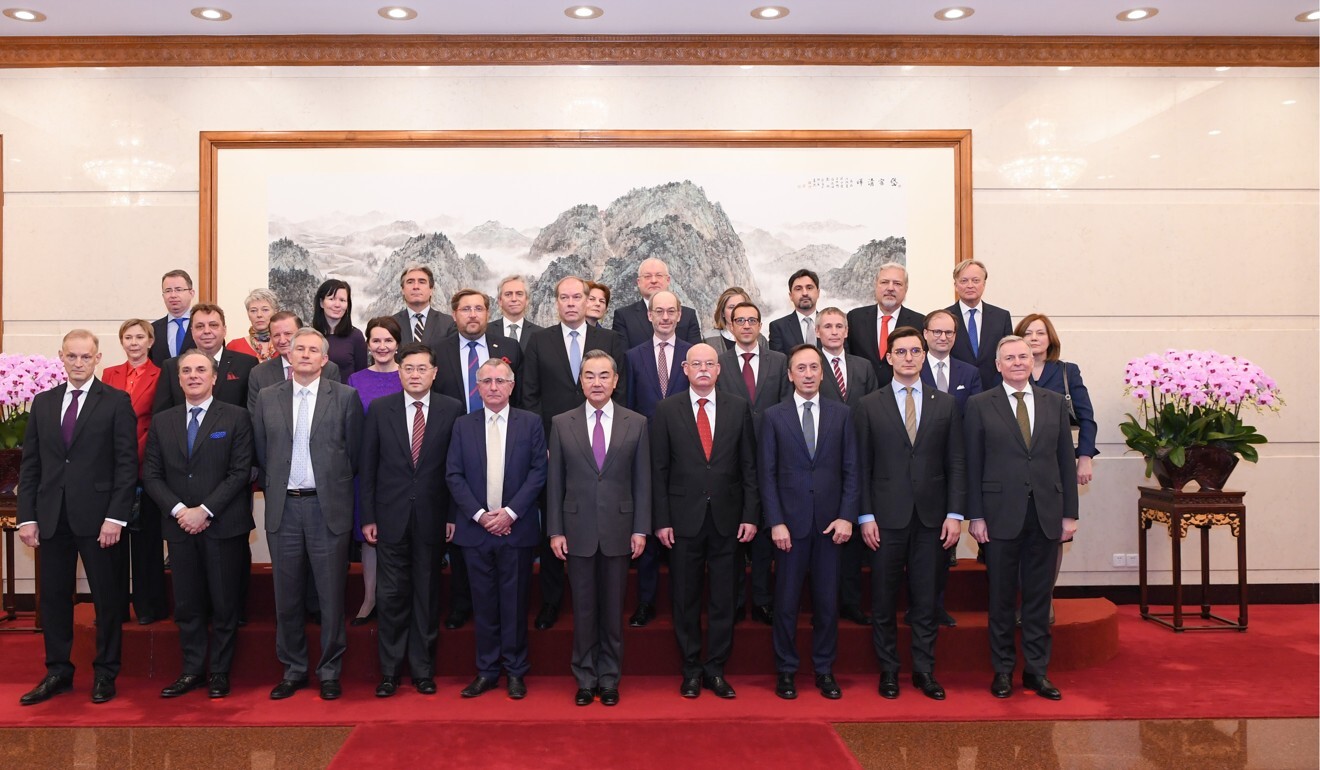 Chinese Foreign Minister Wang Yi (front row, centre) with envoys from the European Union and 27 of its member states. Photo: Xinhua