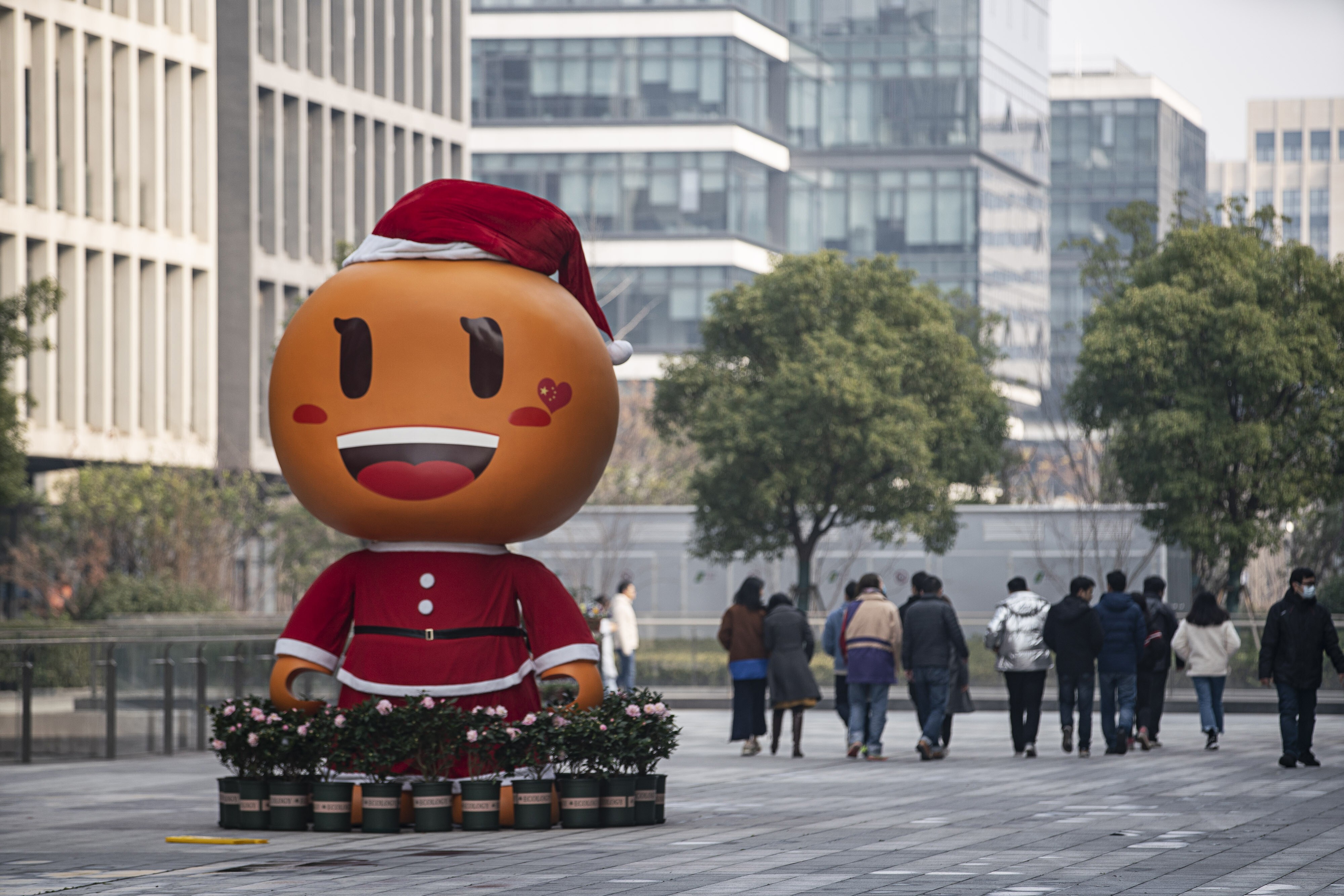 The mascot for Taobao is seen outside an Alibaba Group Holding Ltd. office building in Shanghai, China, on Thursday. Photo: Bloomberg