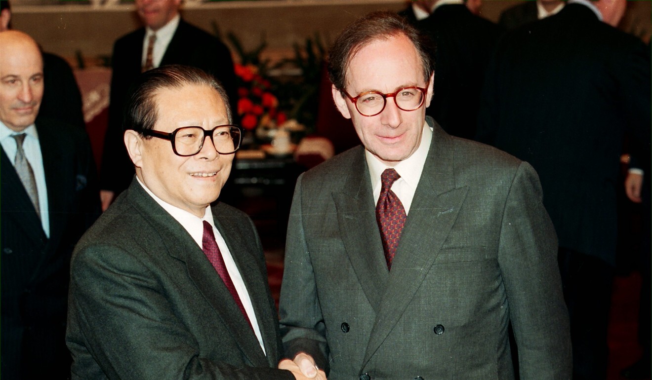 Chinese leader Jiang Zemin (left) shakes hands with British foreign secretary Malcolm Rifkind. Photo: SCMP