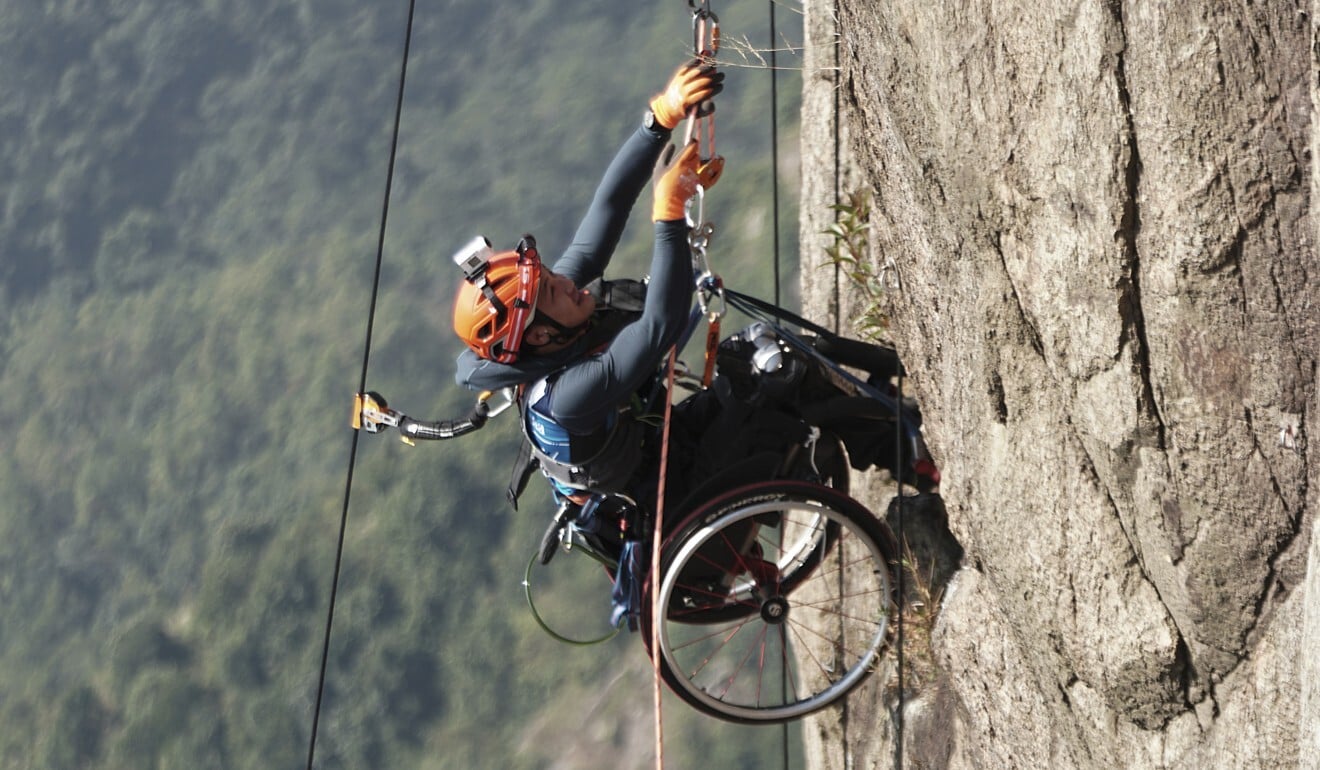 Hong Kong Wheelchair Climber Lai Chi wai Ready To Summit Nina Tower hong-kong-wheelchair-climber-lai-chi-wai-ready-to-summit-nina-tower