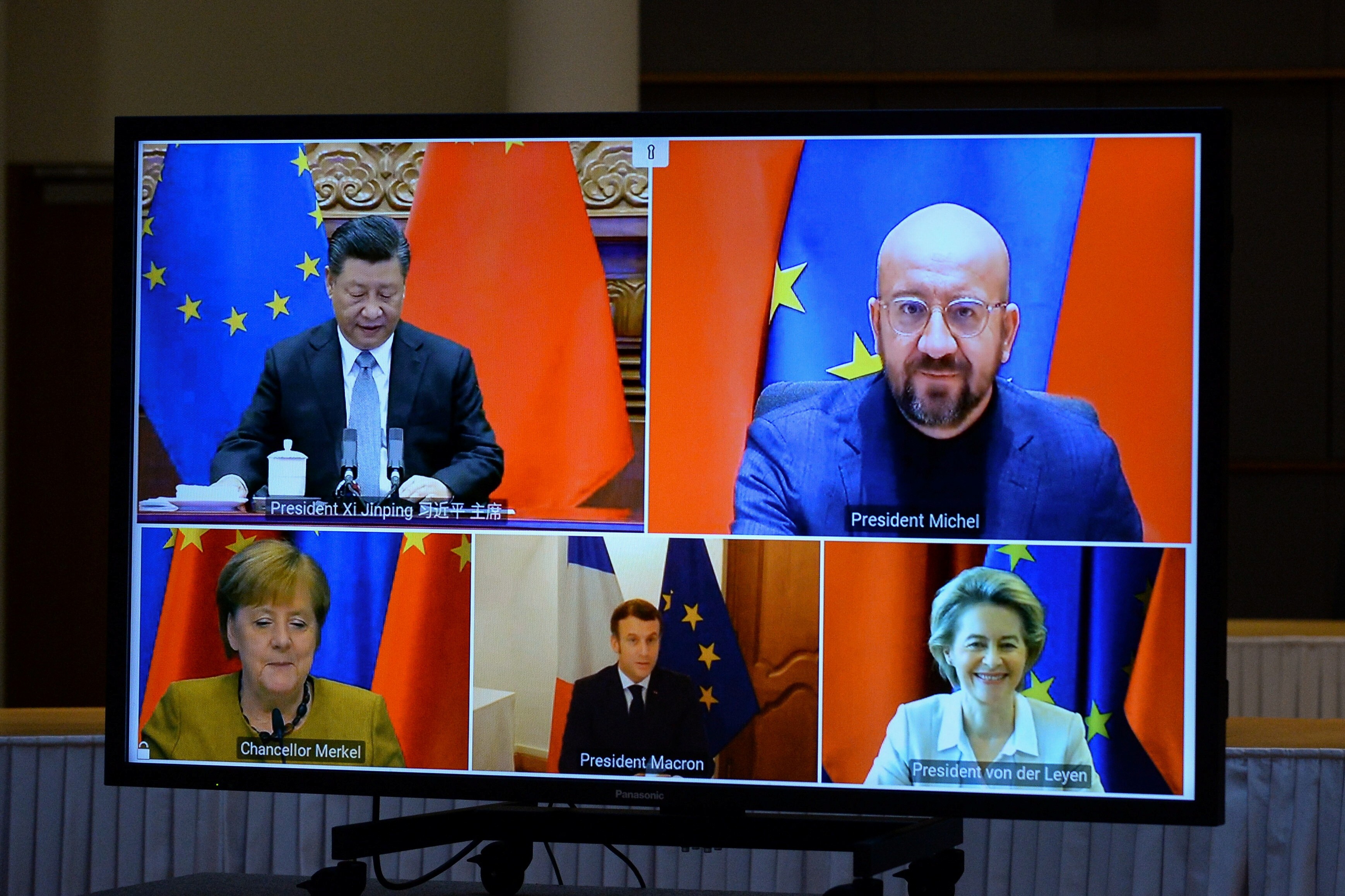 (Clockwise from top left) Chinese President Xi Jinping, European Council President Charles Michel, European Commission President Ursula von der Leyen, French President Emmanuel Macron and German Chancellor Angela Merkel take part in a videoconference on Wednesday. Photo: Reuters