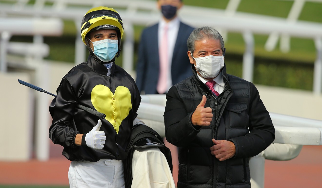 Joao Moreira and Tony Cruz celebrate Circuit Three’s victory.