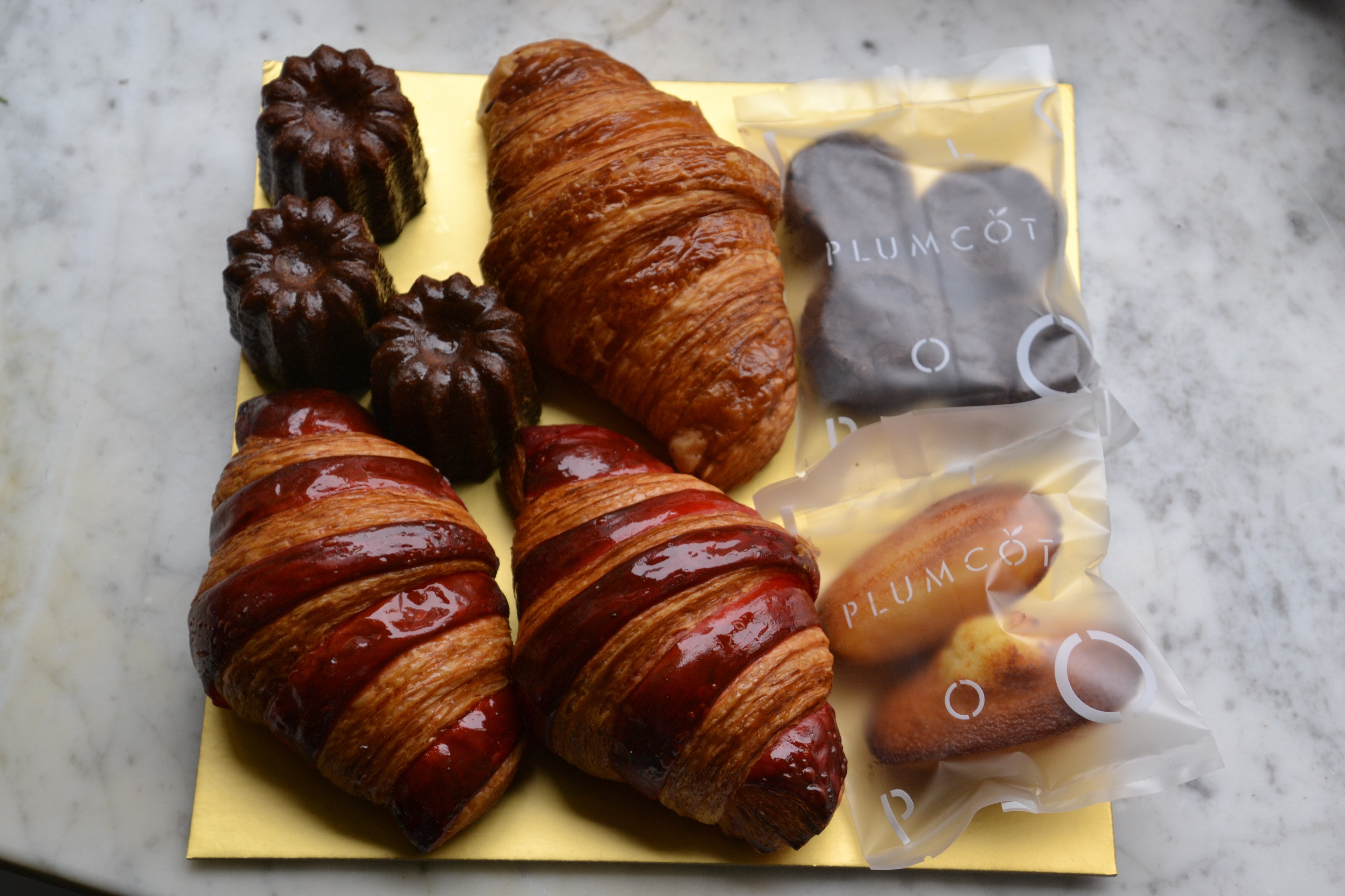 Selection of croissants and canelés at Plumcot. Photo: Chris Dwyer