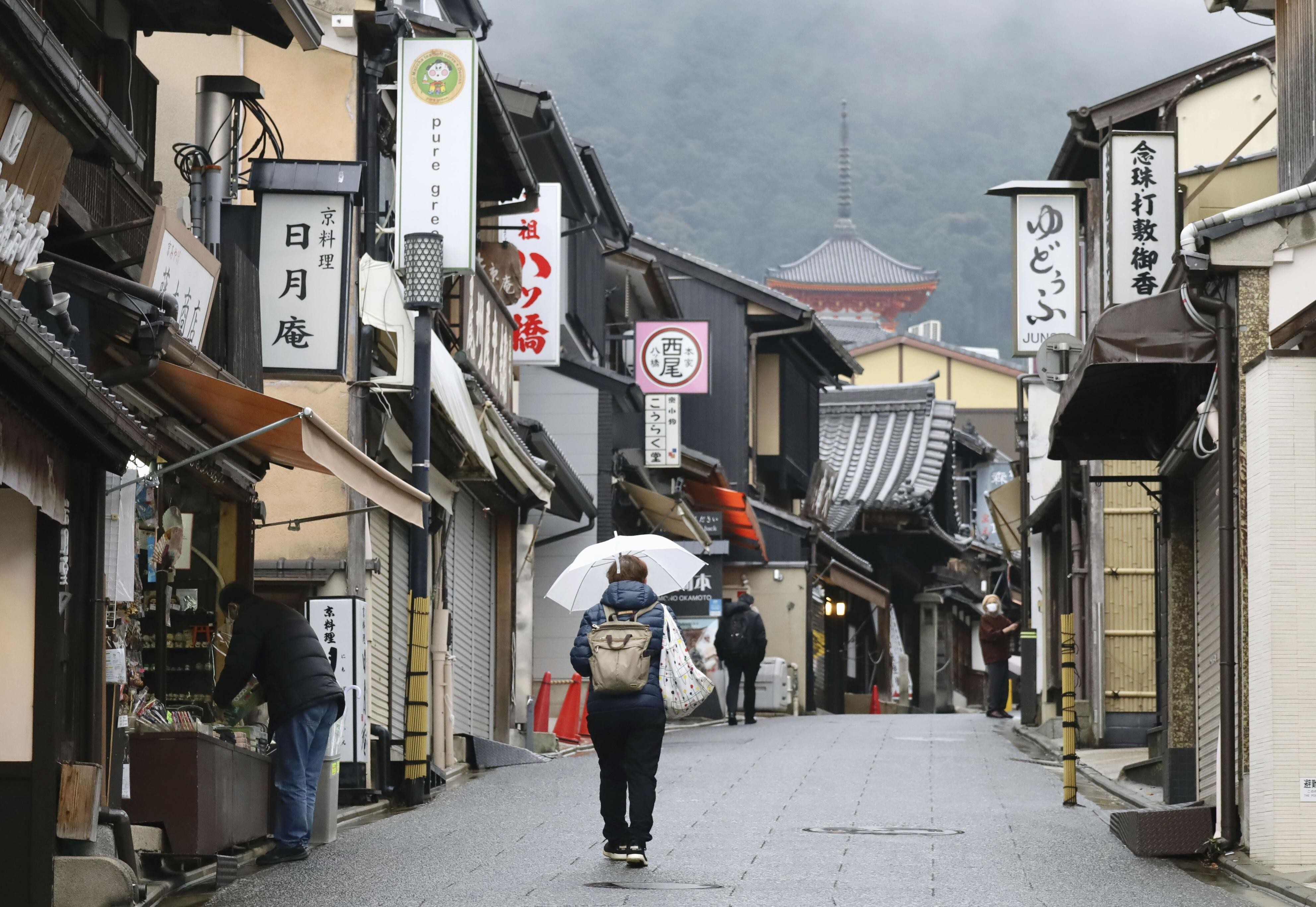 A street in Kyoto is virtually empty on December 28. Japan should recast its economy instead of depending on traditional sectors such as tourism. Photo: Kyodo