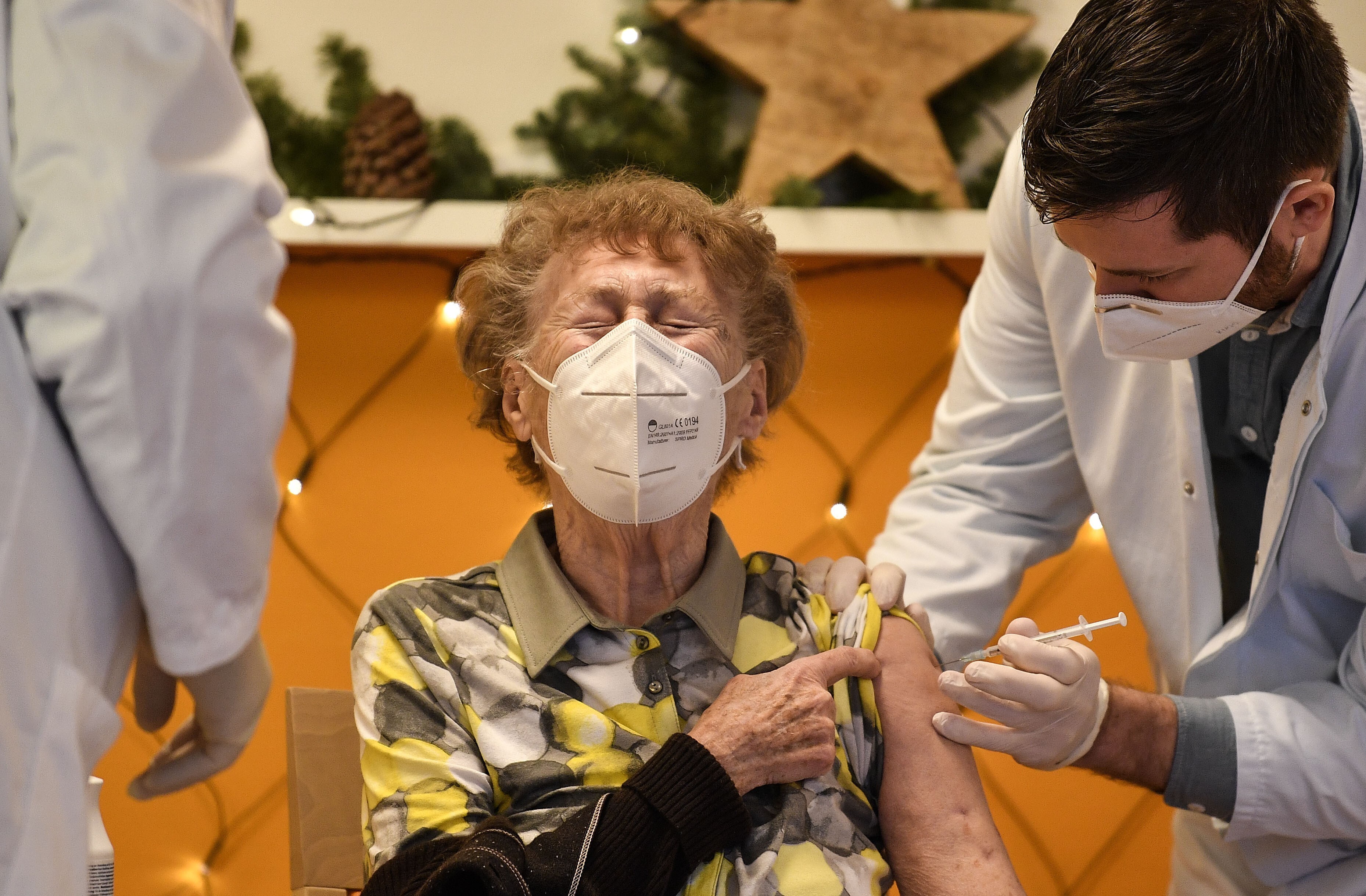 A resident of a nursing home gets a Covid-19 vaccine jab in Cologne, Germany, on December 27. With Europeans and North Americans now rolling up their sleeves to receive coronavirus vaccines, the route out of the pandemic now seems clear to many in the West, even if the roll-out will take many months. But for poorer countries, the road will be far longer and rougher. Photo: AP