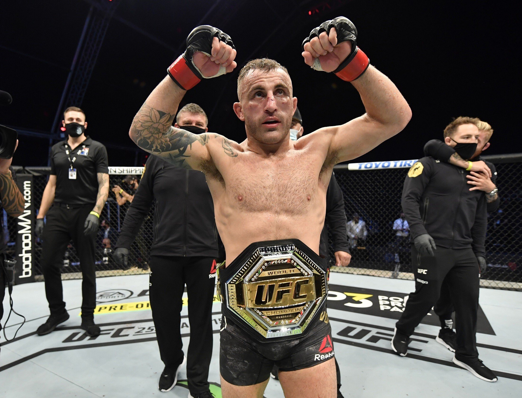 Alexander Volkanovski celebrates after his split decision victory over Max Holloway at UFC 251. Photo: Jeff Bottari/Zuffa LLC
