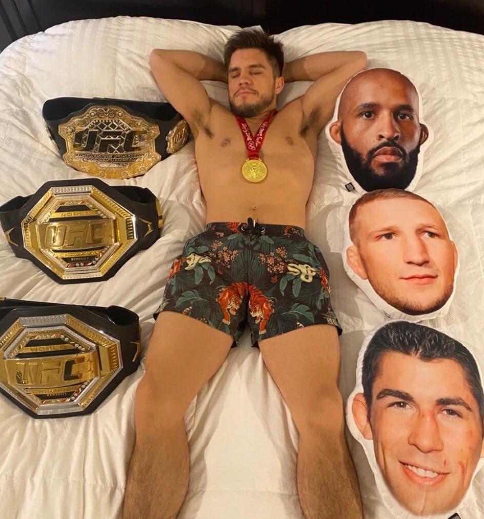 Former UFC bantamweight champion Henry Cejudo ‘sleeps’ with his belts and pillows featuring Demetrious Johnson, TJ Dillashaw and Dominick Cruz’s faces. Photo: Instagram/Henry Cejudo