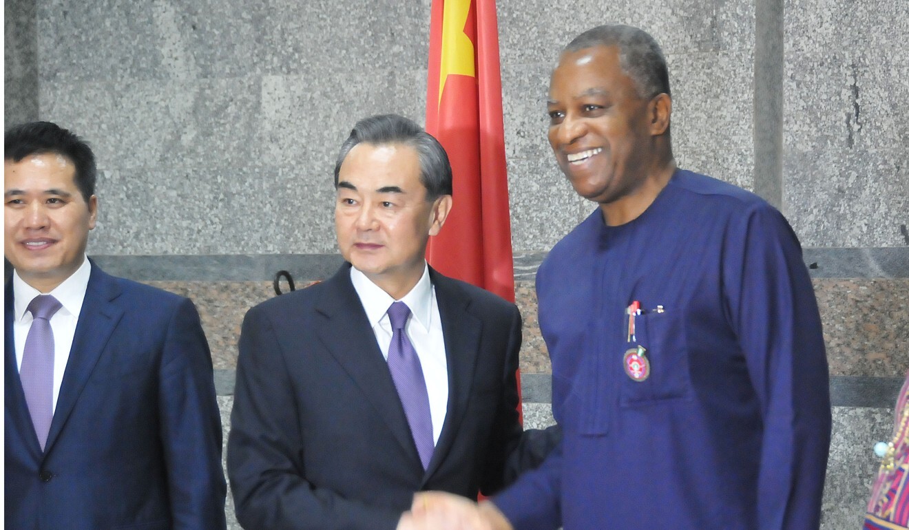 Chinese Foreign Minister Wang Yi shakes hands with his Nigerian counterpart, Geoffrey Onyeama, in Abuja, Nigeria, in 2017. Photo: Xinhua