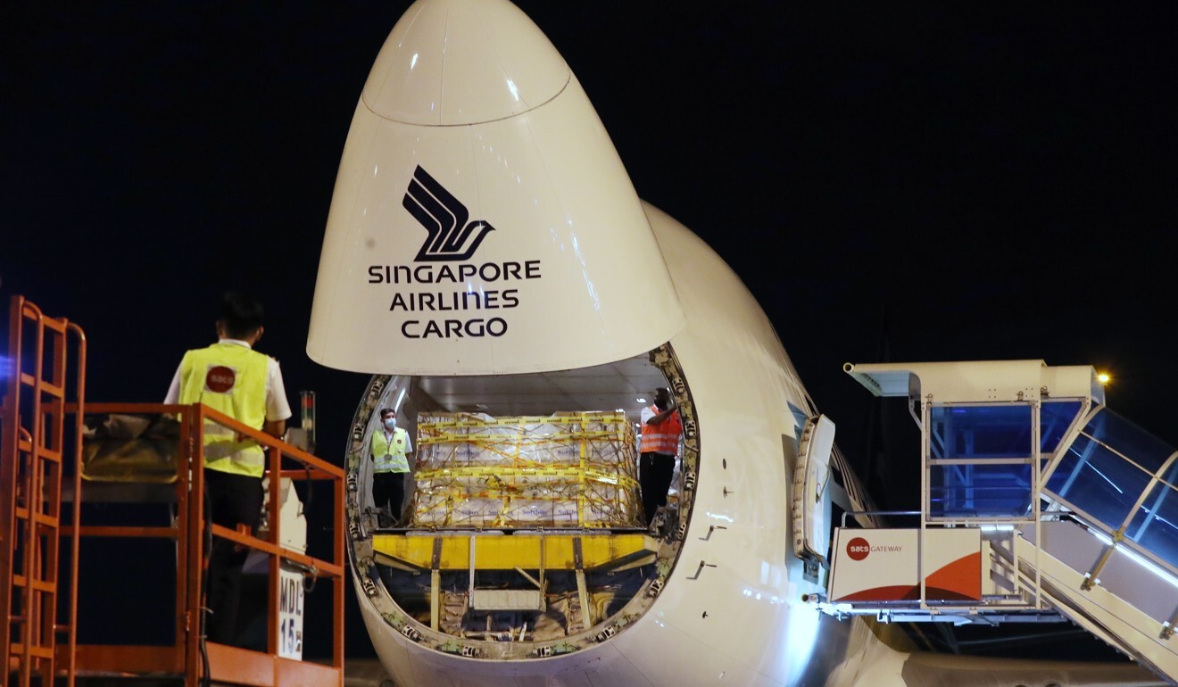 A shipment of the Covid-19 vaccine is unloaded from a Singapore Airlines Boeing 747 cargo plane at Changi Airport in Singapore. Photo: EPA