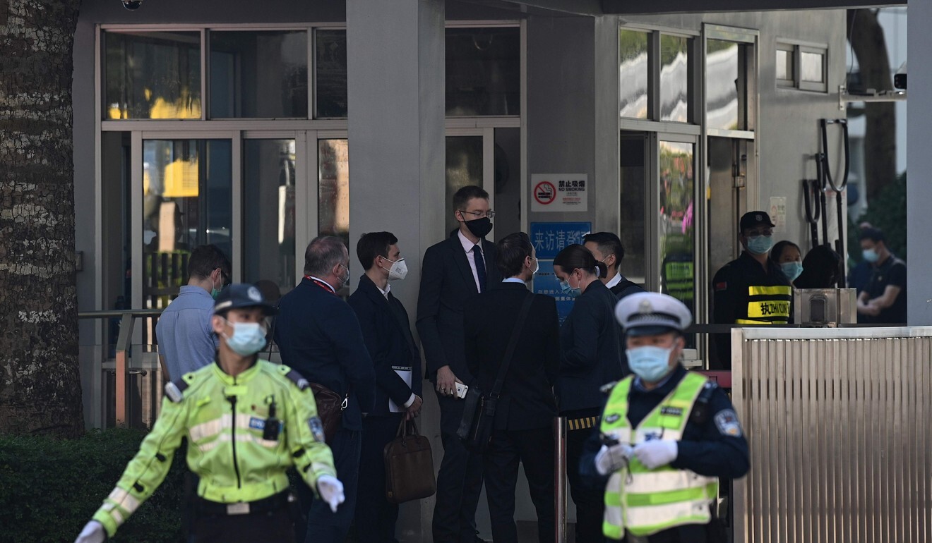 Diplomats from the US, Britain, Australia, Canada, Portugal and the Netherlands wait outside the Yantian District People’s Court after being denied entry to last week’s trial. Photo: AFP