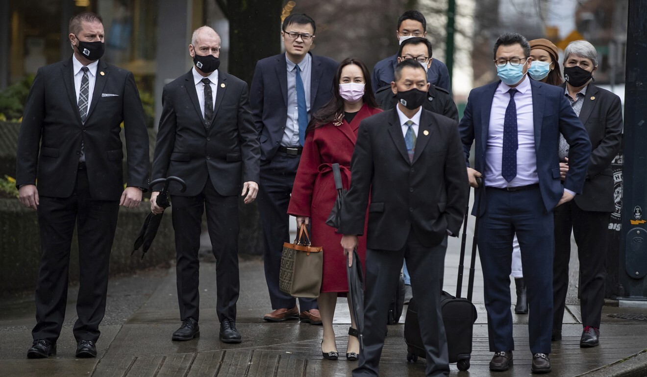 Meng Wanzhou, centre, returns to the Supreme Court of British Columbia in Vancouver on December 11, 2020. Photo: The Canadian Press via AP