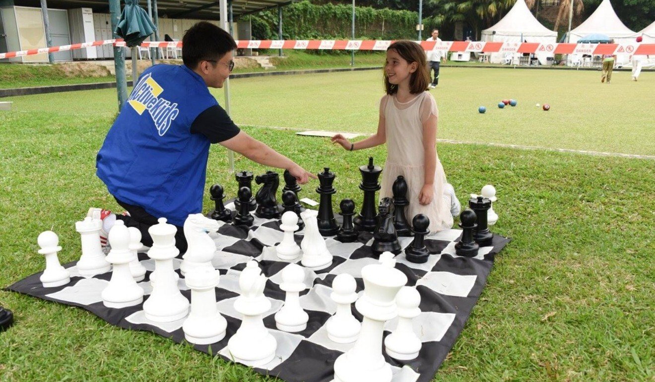 A giant chess board is set up on the grounds of a local club in Hong Kong. Photo: ActiveKids