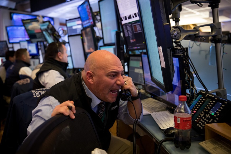 Traders at the New York Stock Exchange (NYSE) on March 18, 2020. Photo: Xinhua
