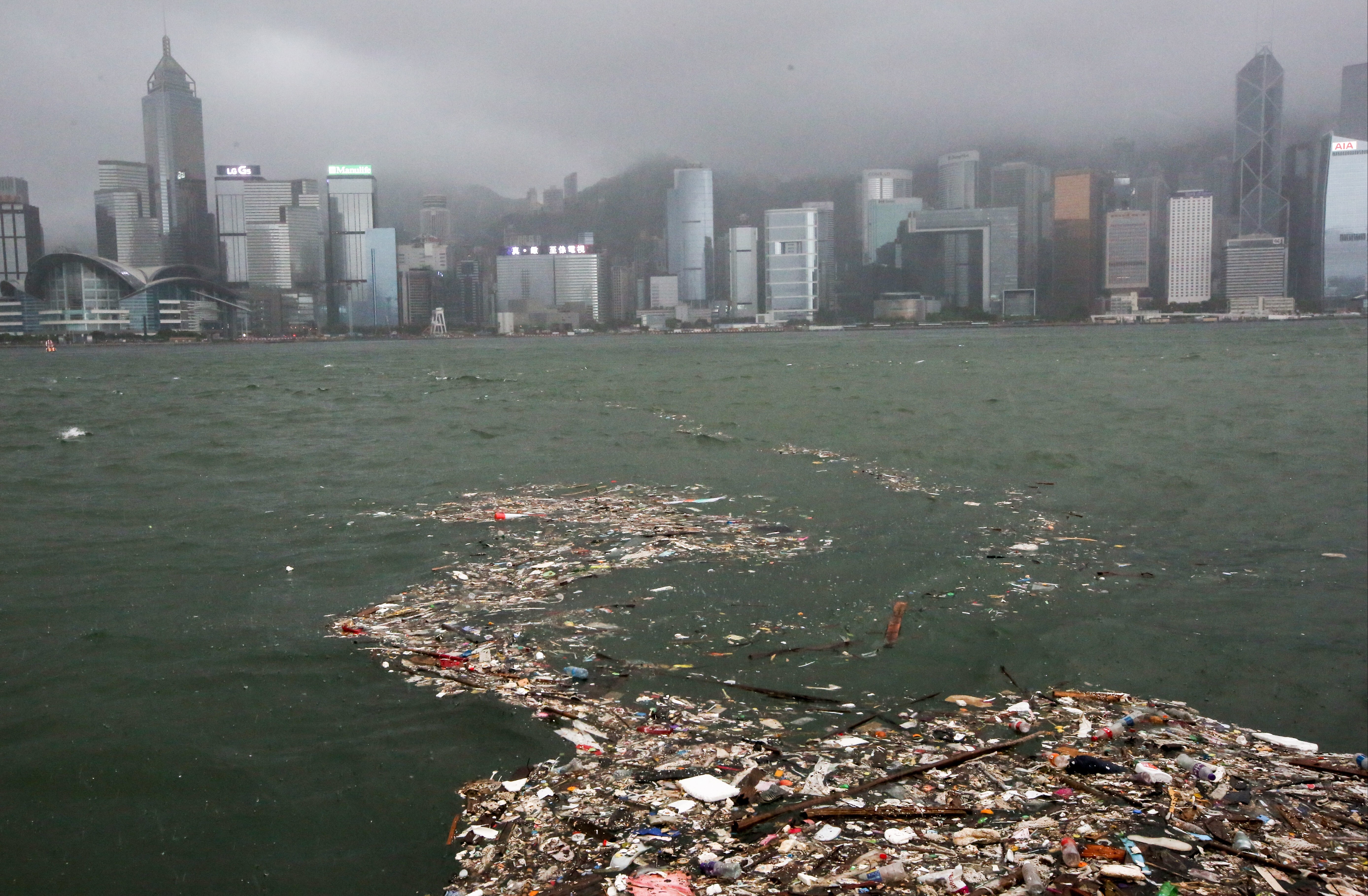 Trash floats in Victoria Harbour. Photo: SCMP / Nora Tam