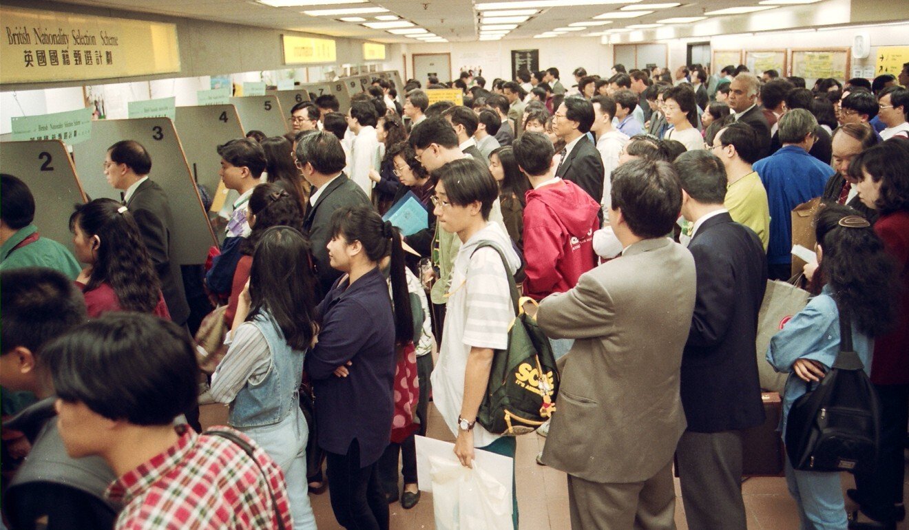Thousands crowd the halls of Immigration Tower in Wan Chai in 1994 to submit applications for British passports under the British Nationality Selection Scheme. Photo: Handout