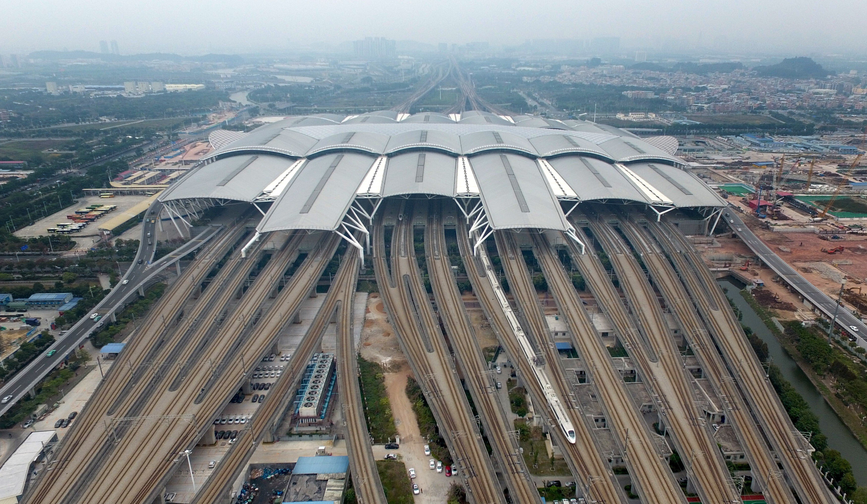 A bullet train leaves Guangzhou South Railway Station. The bay area plan envisions the city as an international transport hub. Photo: Xinhua