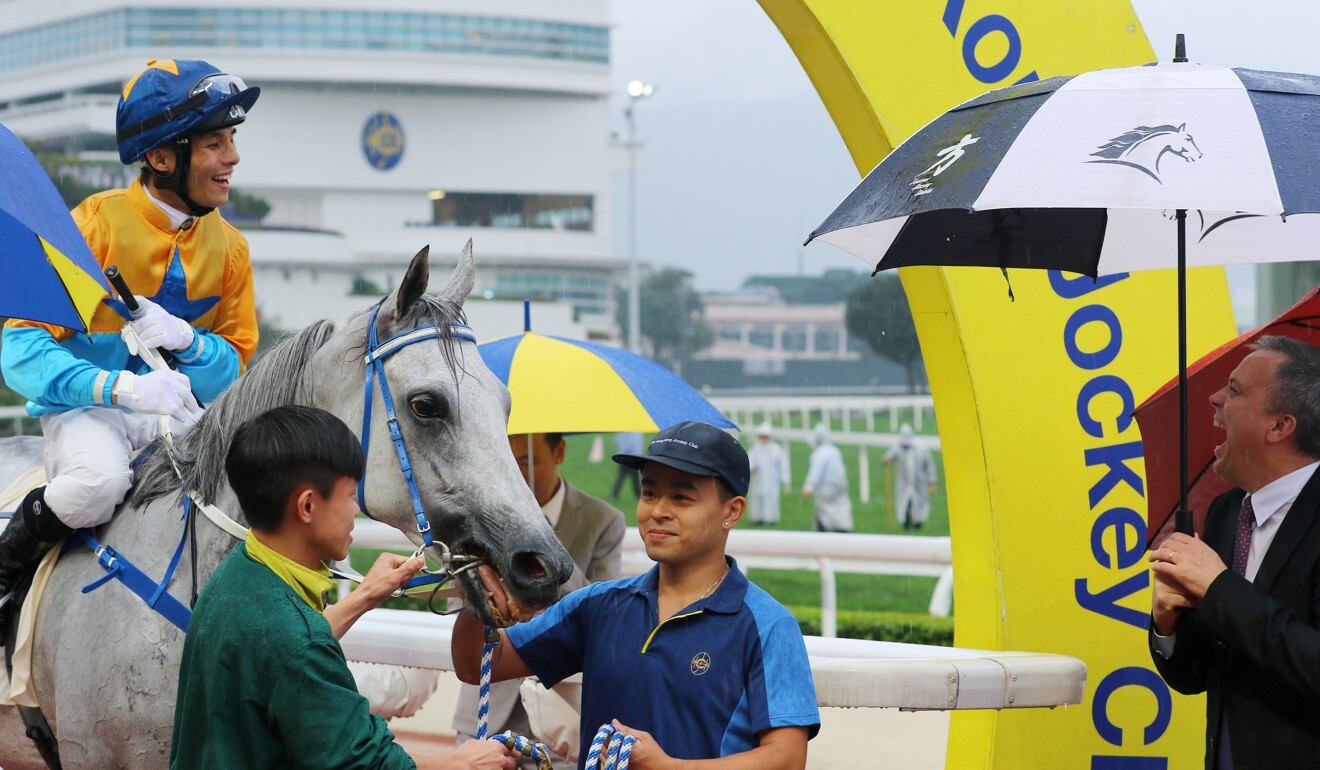 Alfred Chan and Caspar Fownes celebrate Best Effort’s win at Sha Tin in April 2019.