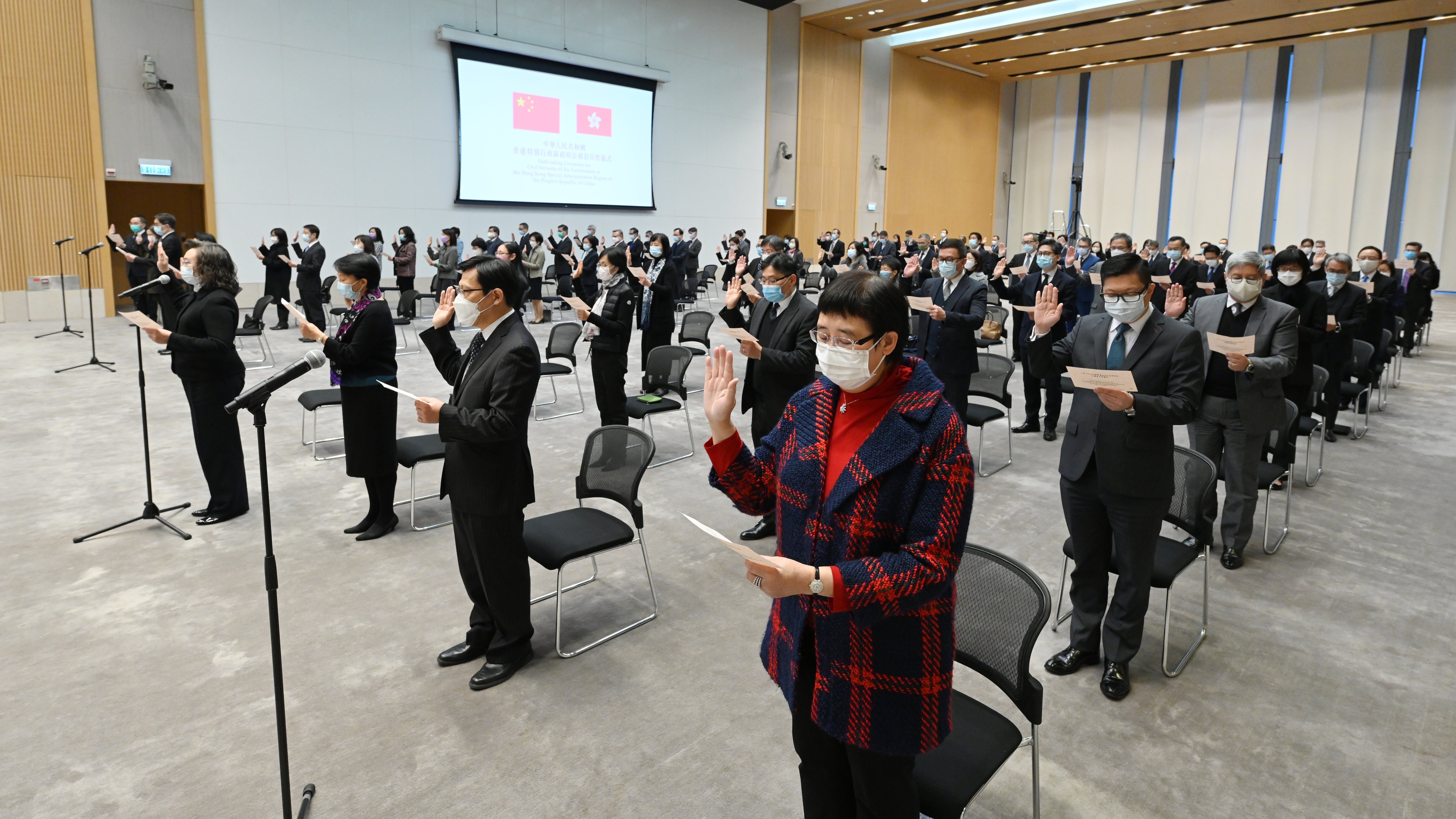 Hong Kong civil servants take their oath of allegiance to the Hong Kong SAR and the People’s Republic of China, on December 18. Photo: Handout