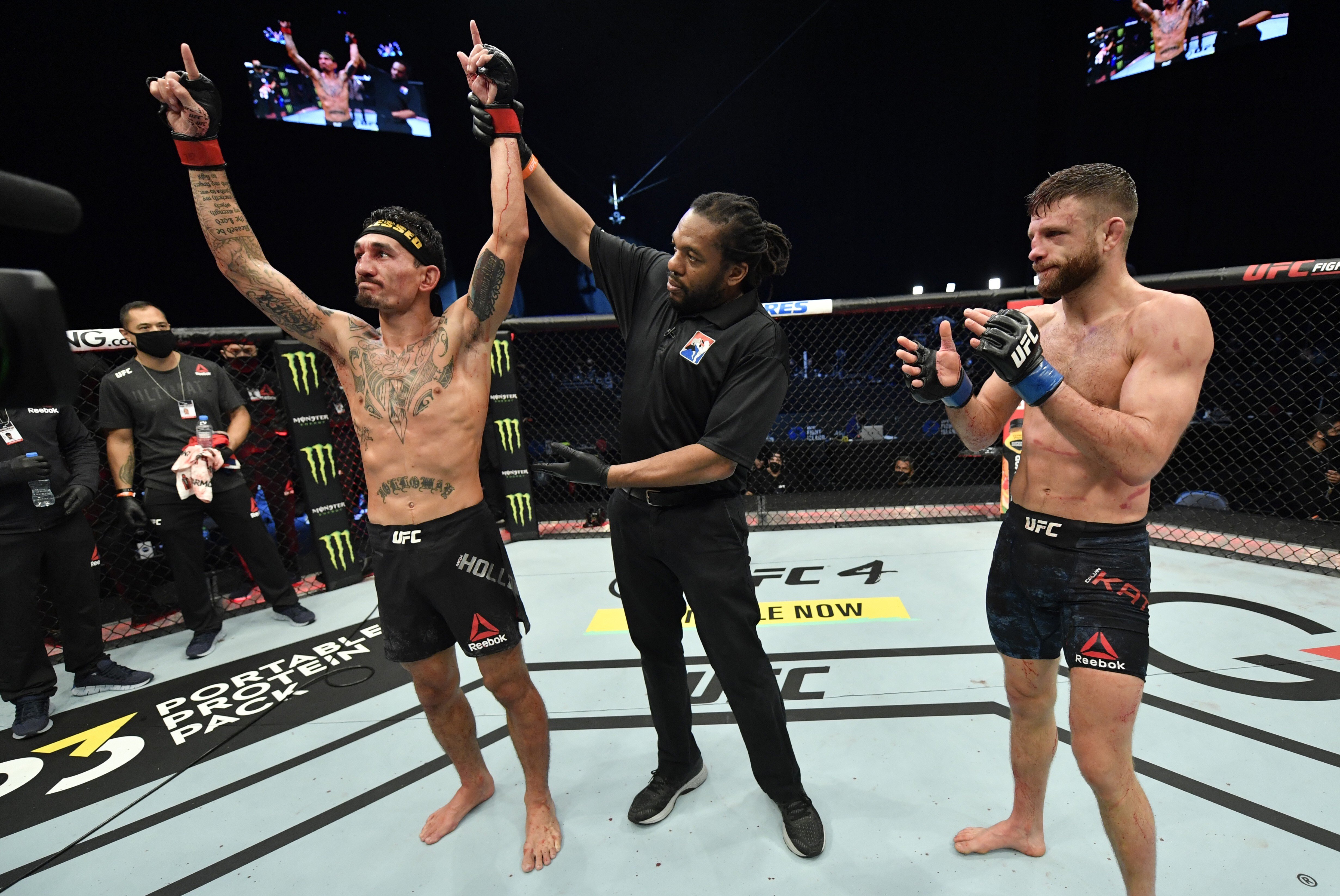 Max Holloway celebrates after his unanimous decision victory over Calvin Kattar in their featherweight main event at UFC Fight Island 7 inside the Etihad Arena on January 17, 2021 in Abu Dhabi. Photos: Jeff Bottari/Zuffa LLC