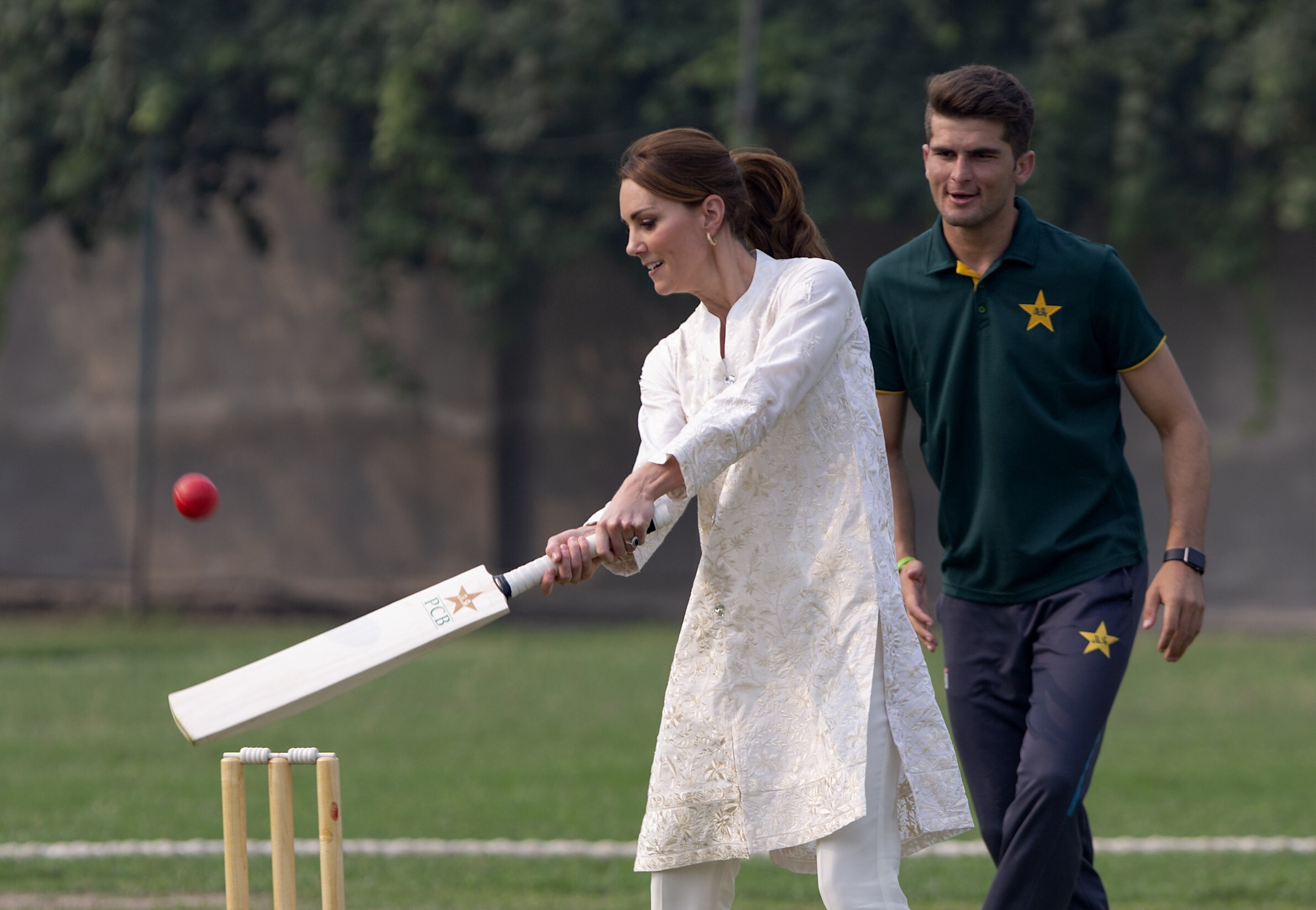 Kate Middleton wore a pair of Oak Leaf hoop earrings from Asprey during her visit at the Pakistan Cricket Academy in Lahore, Pakistan, 2019. Photo: AP