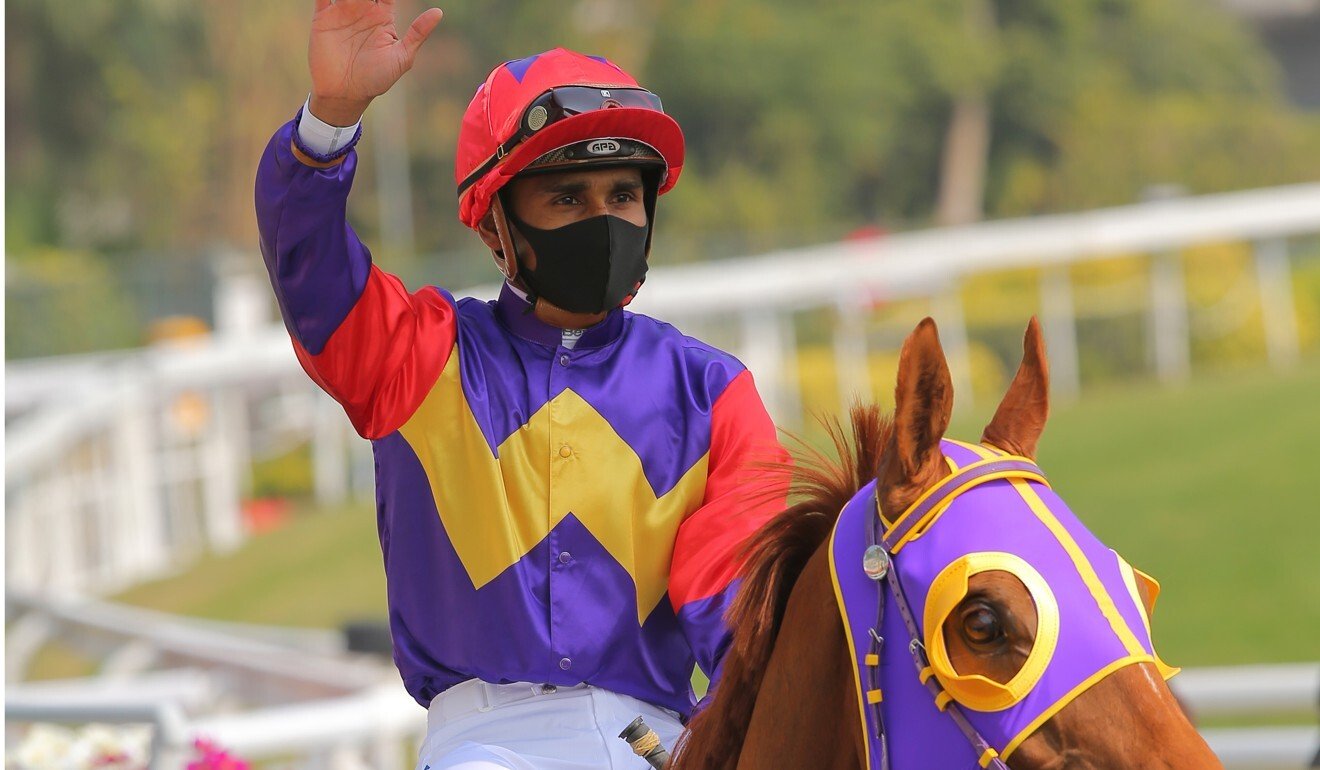 Karis Teetan celebrates his win aboard Shanghai Dragon at Sha Tin on Sunday.