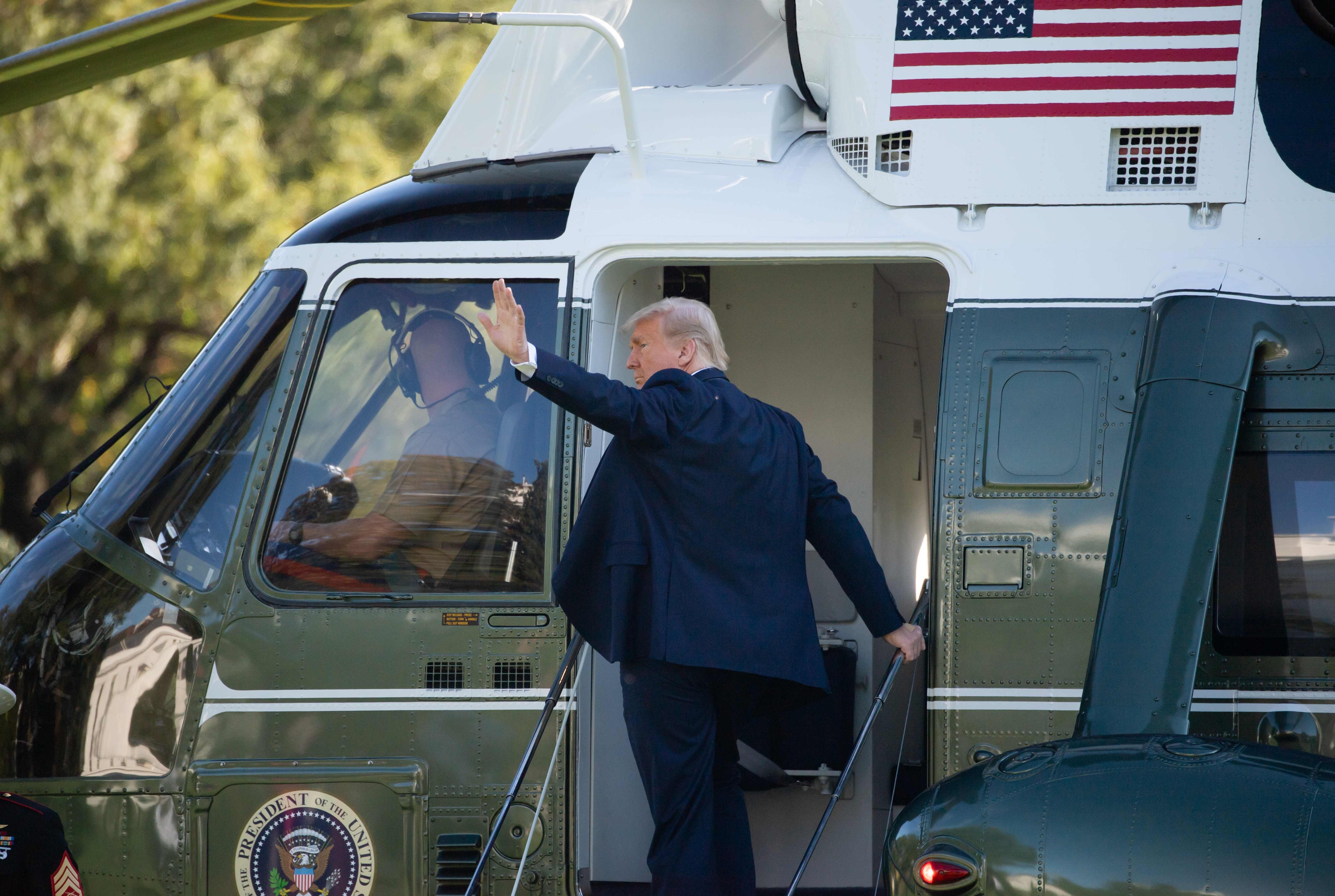 Donald Trump boards Marine One as he leaves departs the White House in Washington, on October 14, 2020. Photo: AFP