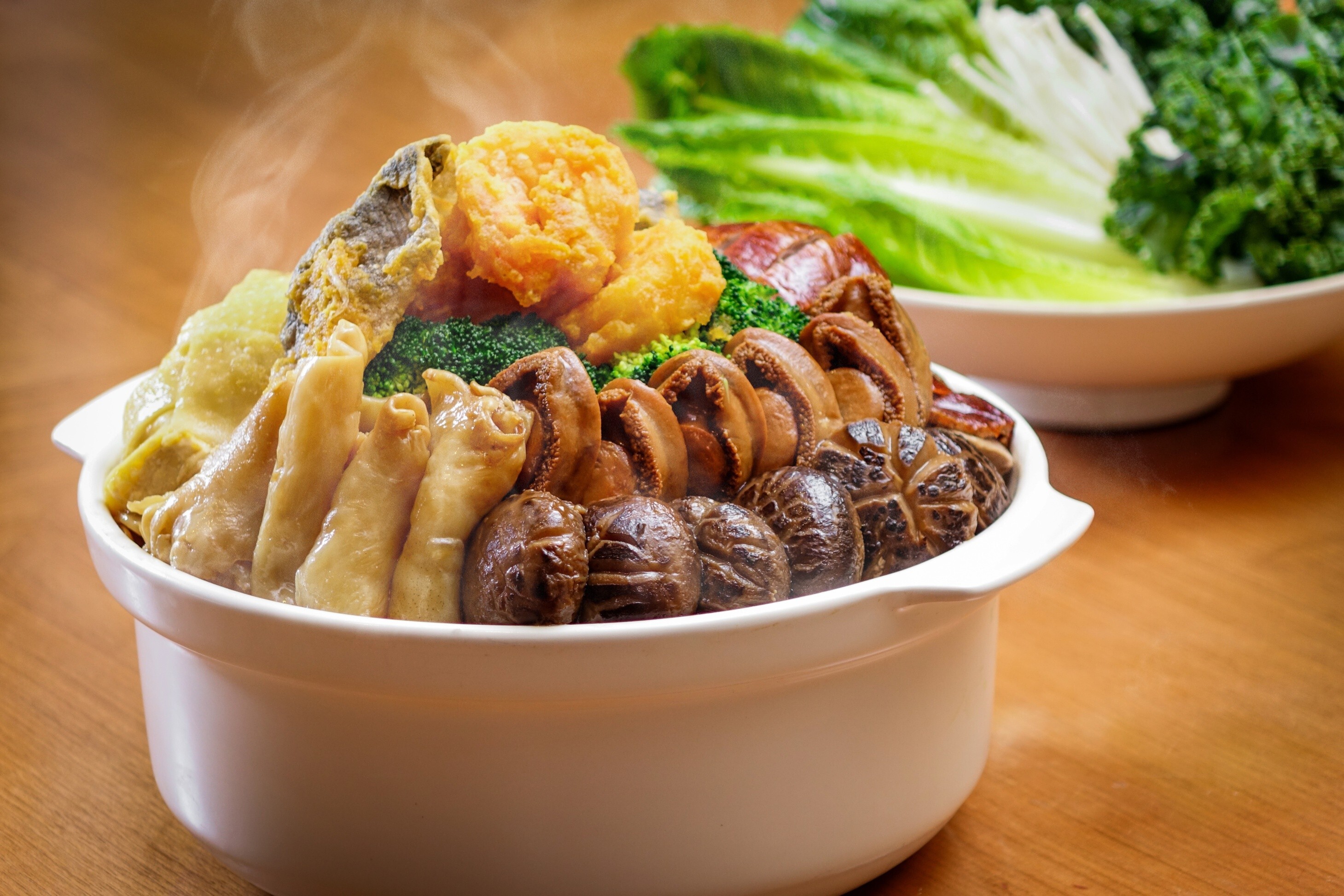 Handout image shows Hyatt Regency, Sha Tin's ÒPoon Choi To GoÓ from HK$1,588 for four people and self pickup to HK$2,288 for six people that is delivered to your door. The ingredients include abalone, fish, chicken, squid, fishballs and bean curd puff. Available from now until February 28, 2021. 15JAN21 [FEATURES] CREDIT: Hyatt Regency