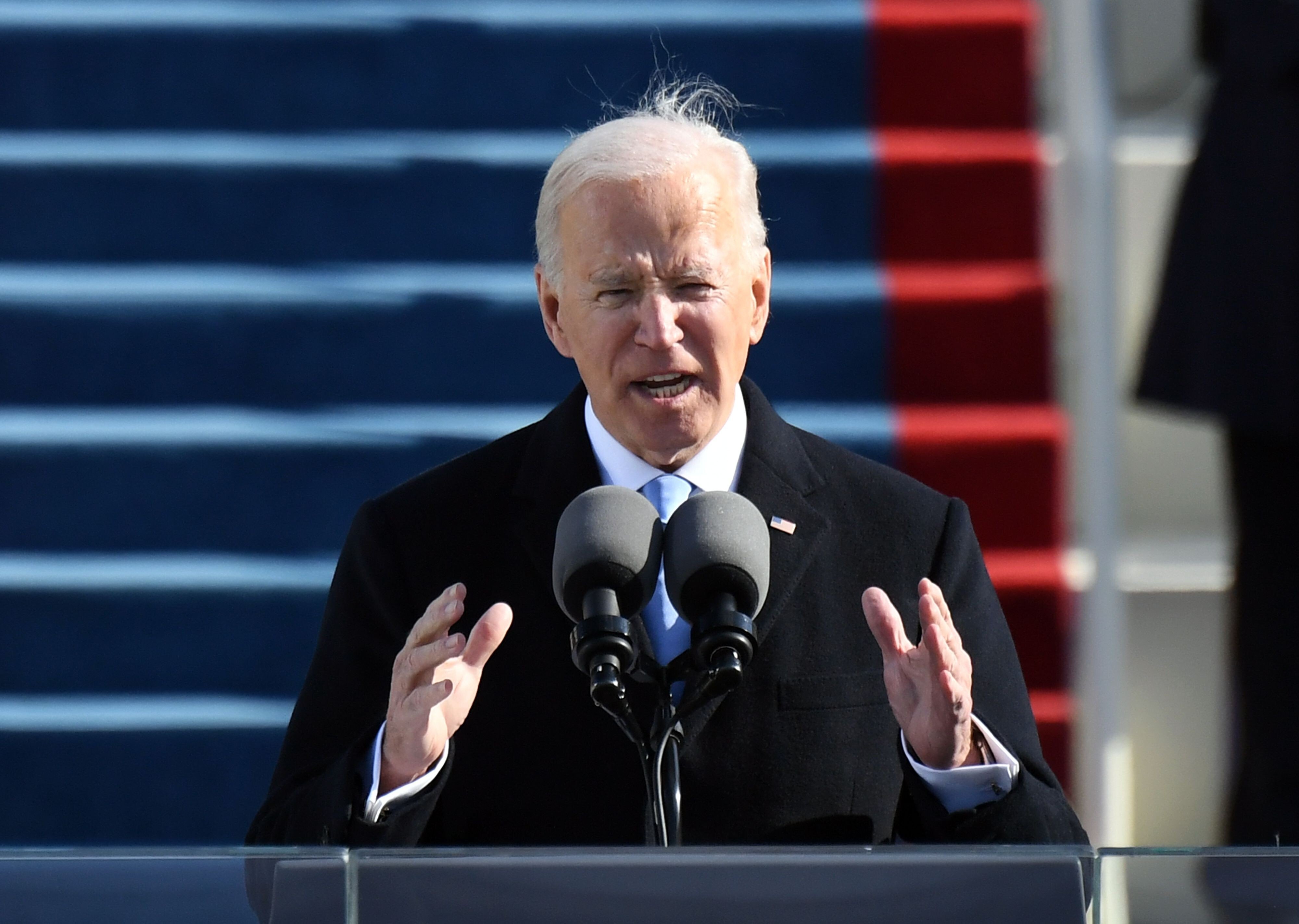 biden-inauguration-new-us-president-pledges-to-unify-a-tense-divided