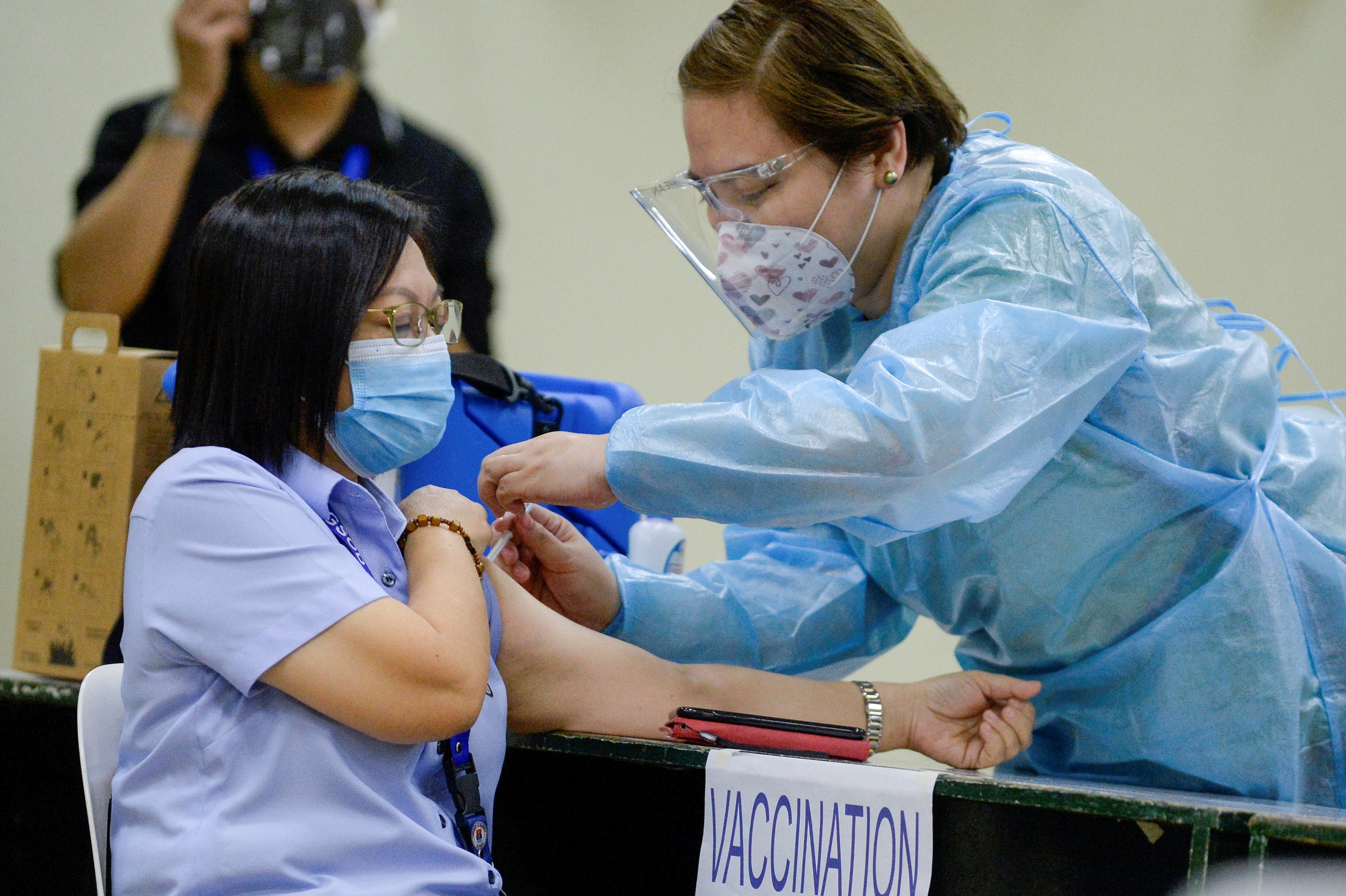 As Philippines seeks Covid-19 vaccines, ghost of Dengvaxia controversy  lingers