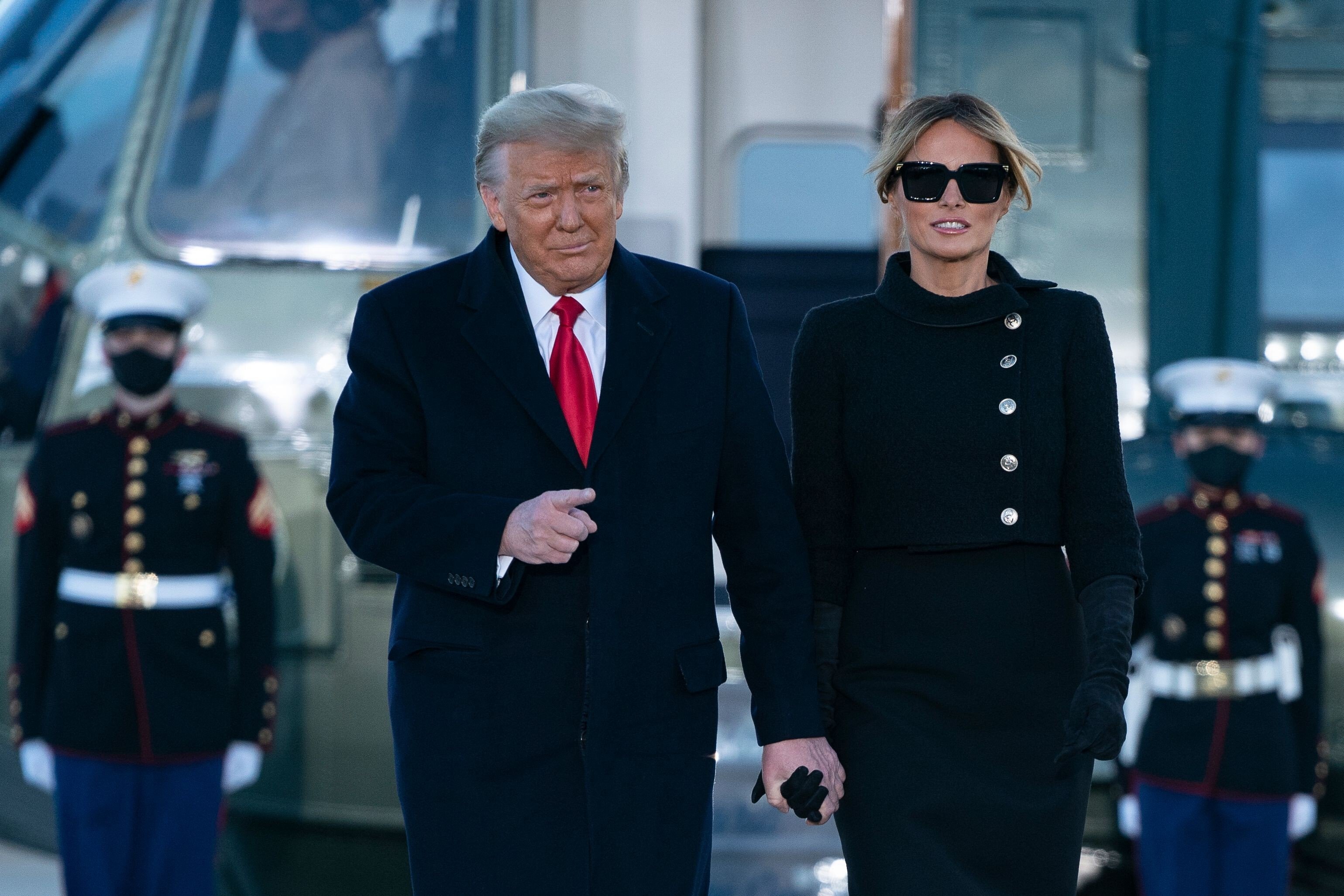 Donald Trump, accompanied by first lady Melania Trump, leaves the White House as US president for the last time. Photo: AFP